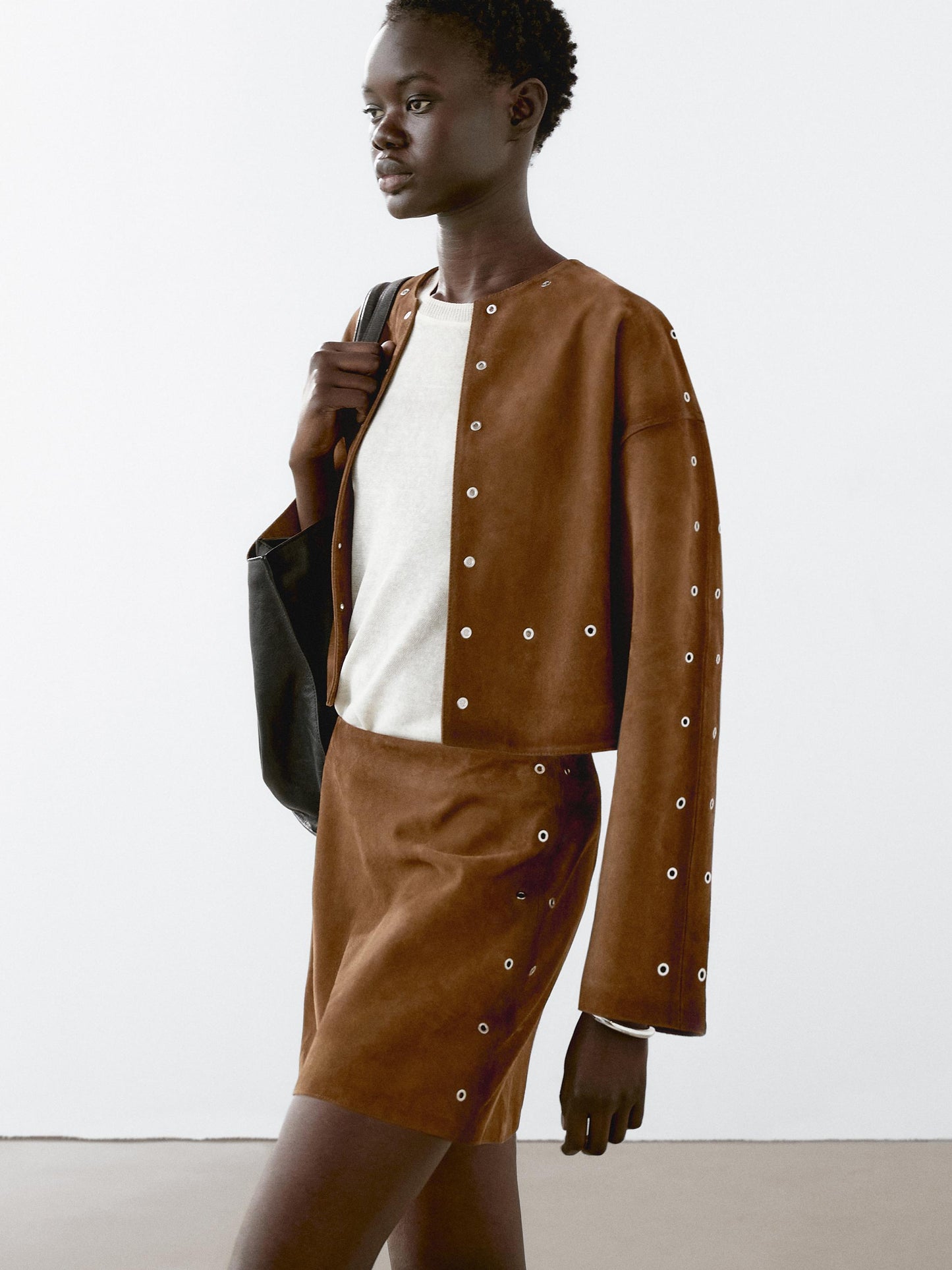 Suede leather jacket with eyelets