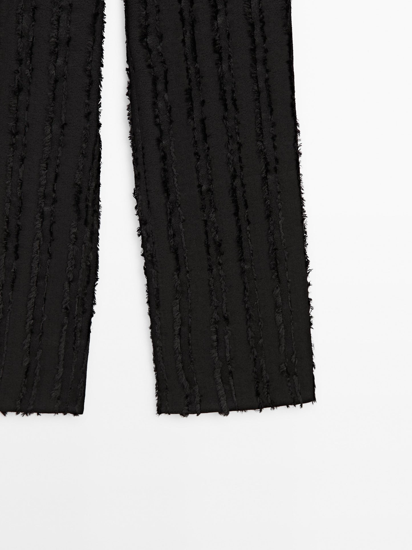 Trousers with fringe detail