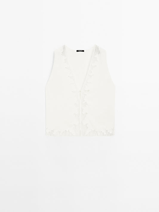 Flowing blouse with lace detail