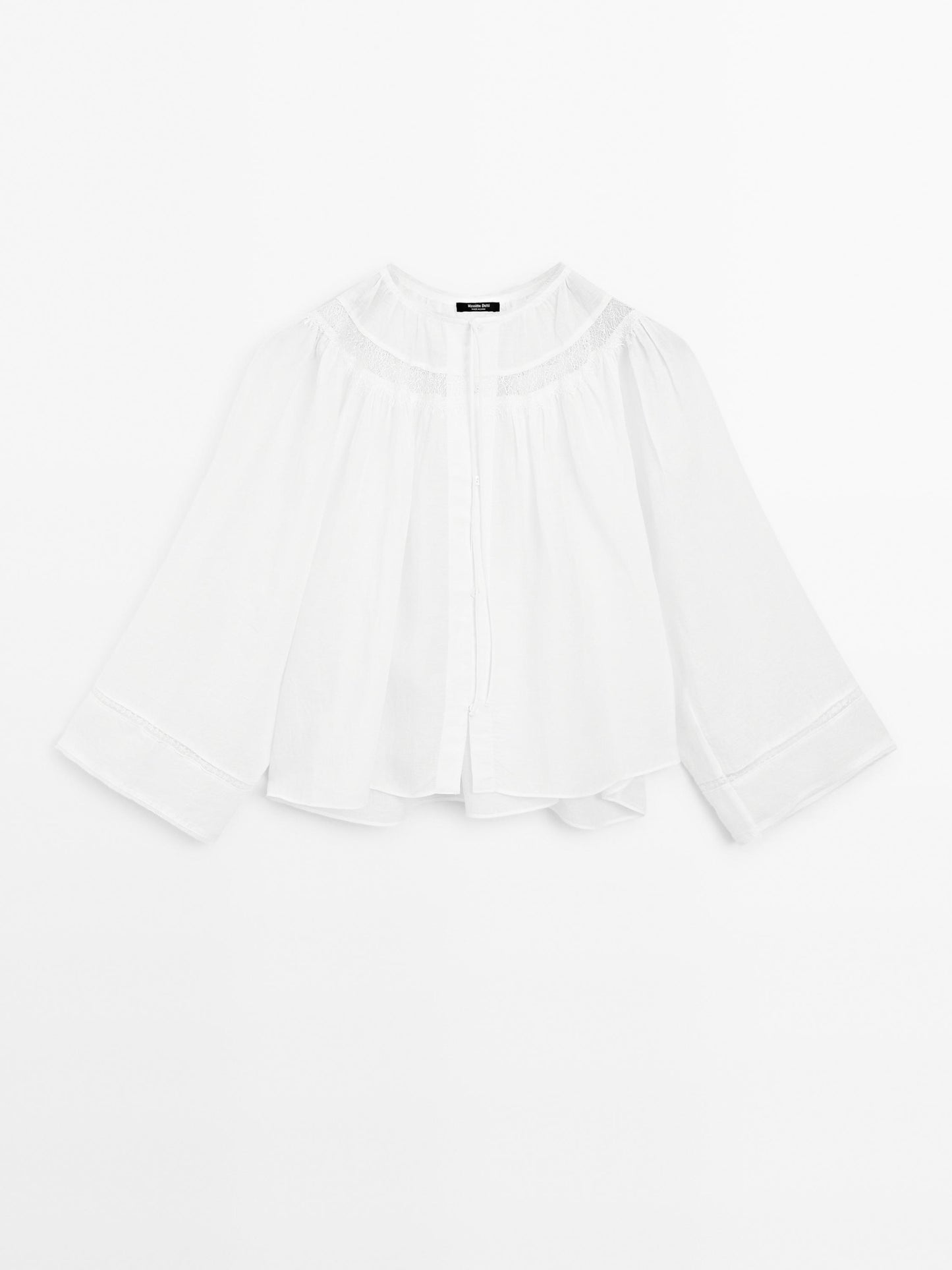 Flowing blouse with lace detail
