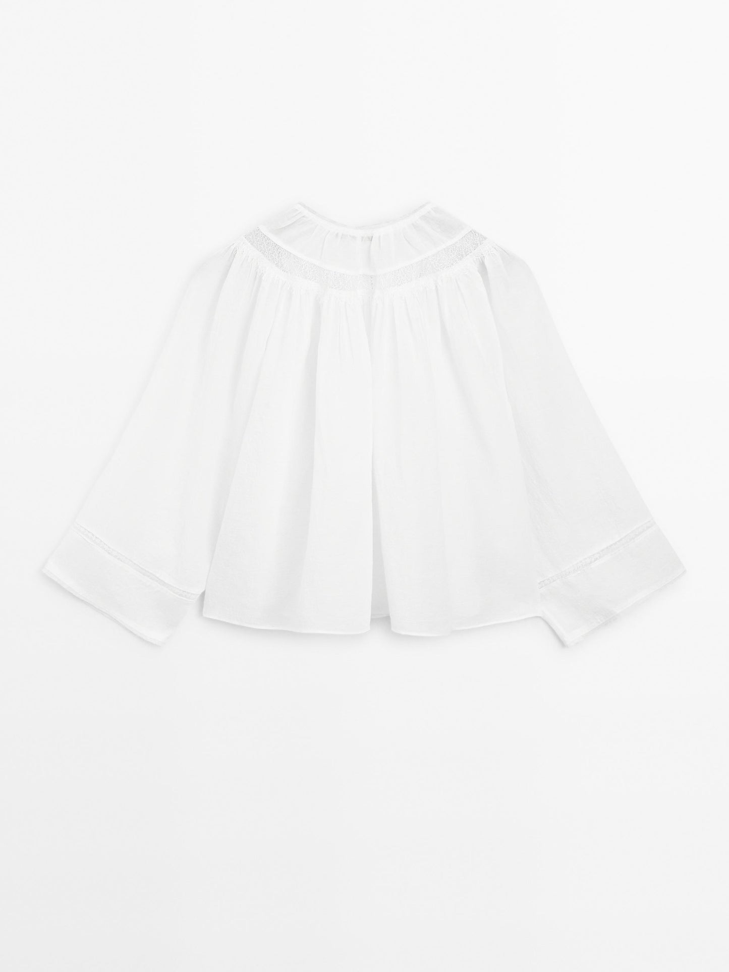 Flowing blouse with lace detail