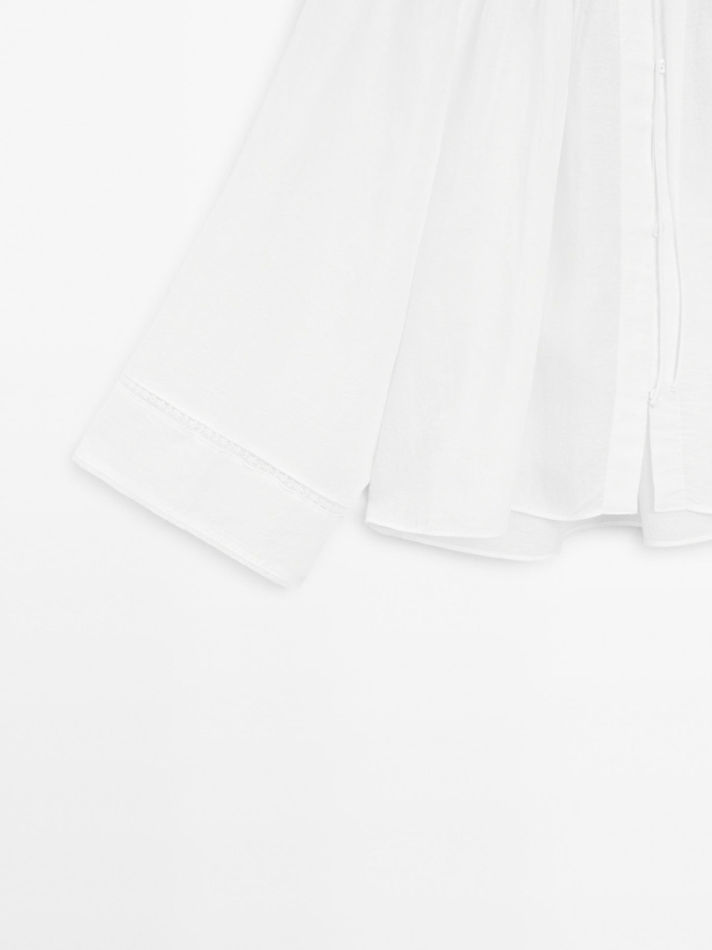 Flowing blouse with lace detail