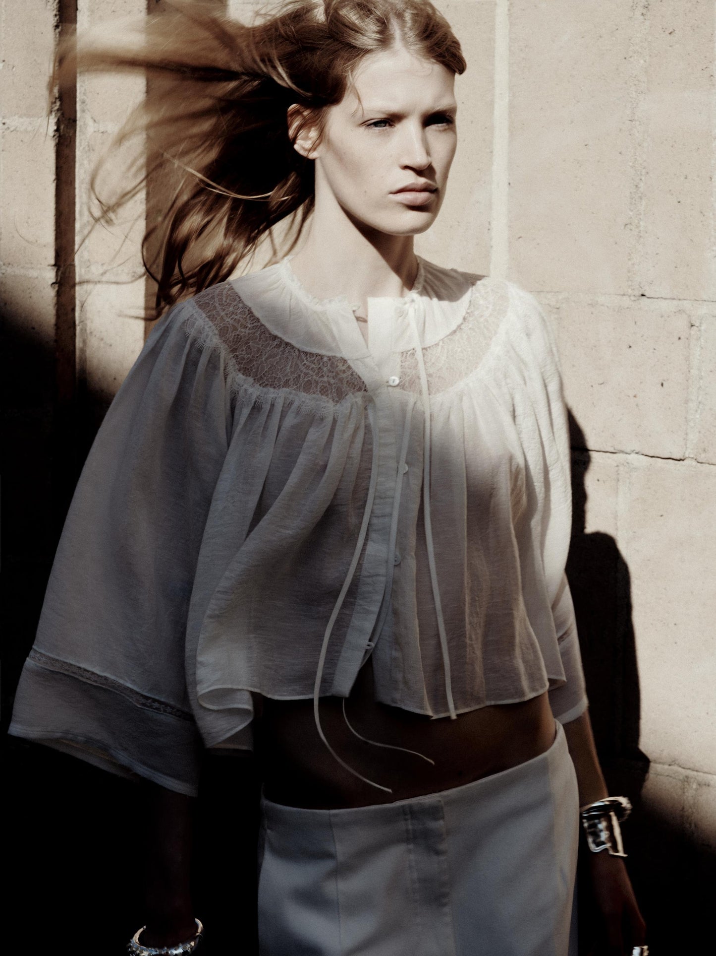 Flowing blouse with lace detail