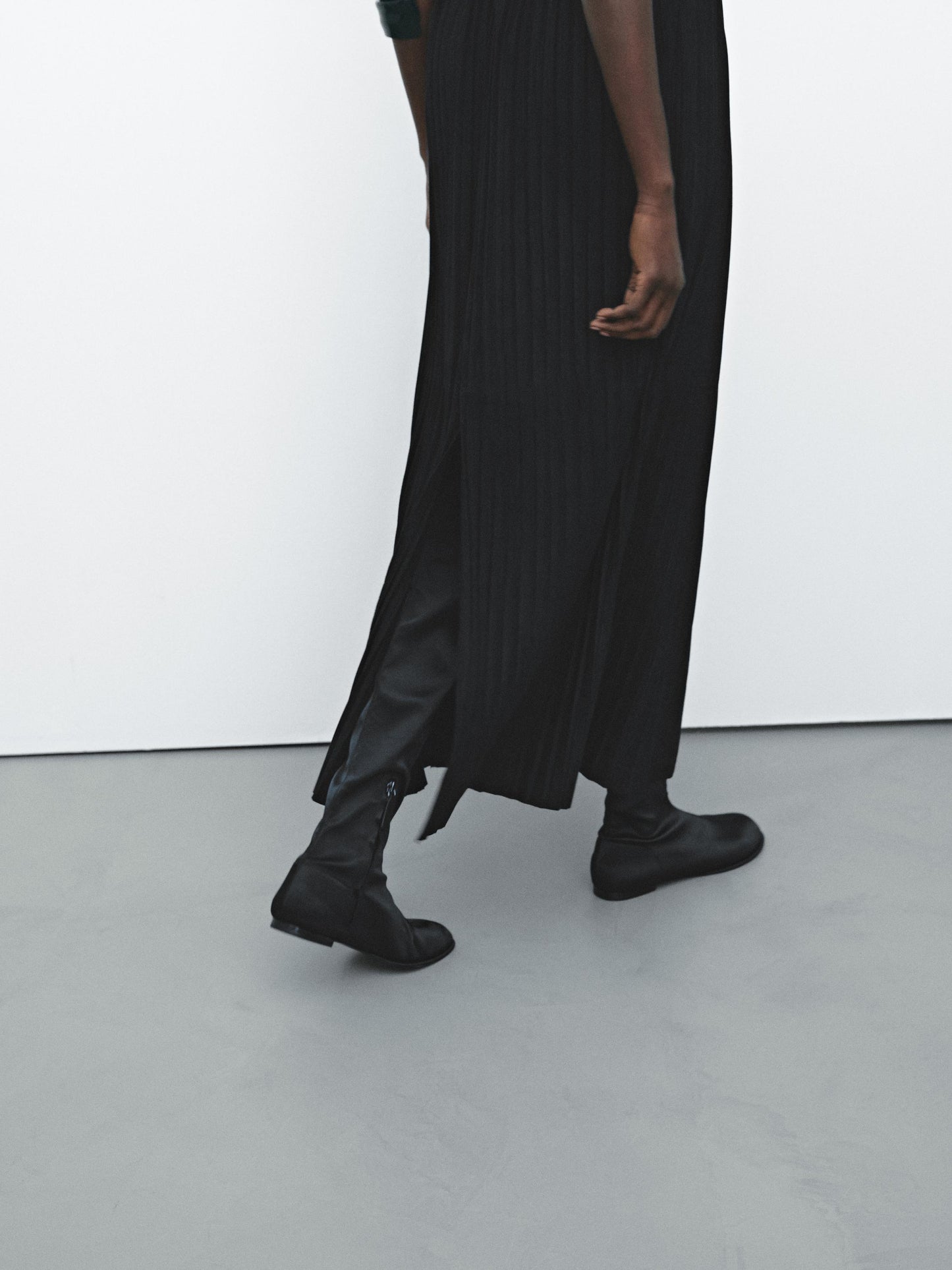 Pleated suede leather skirt