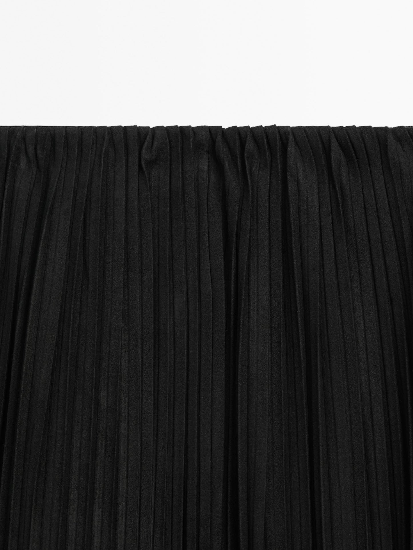 Pleated suede leather skirt
