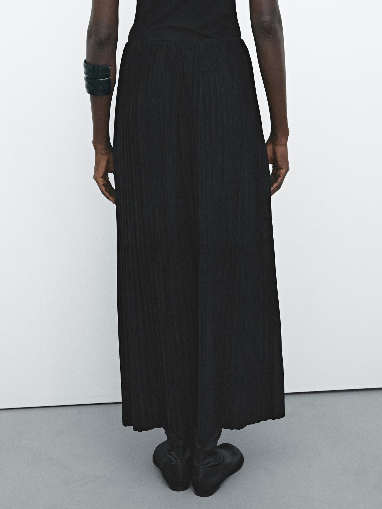 Pleated suede leather skirt