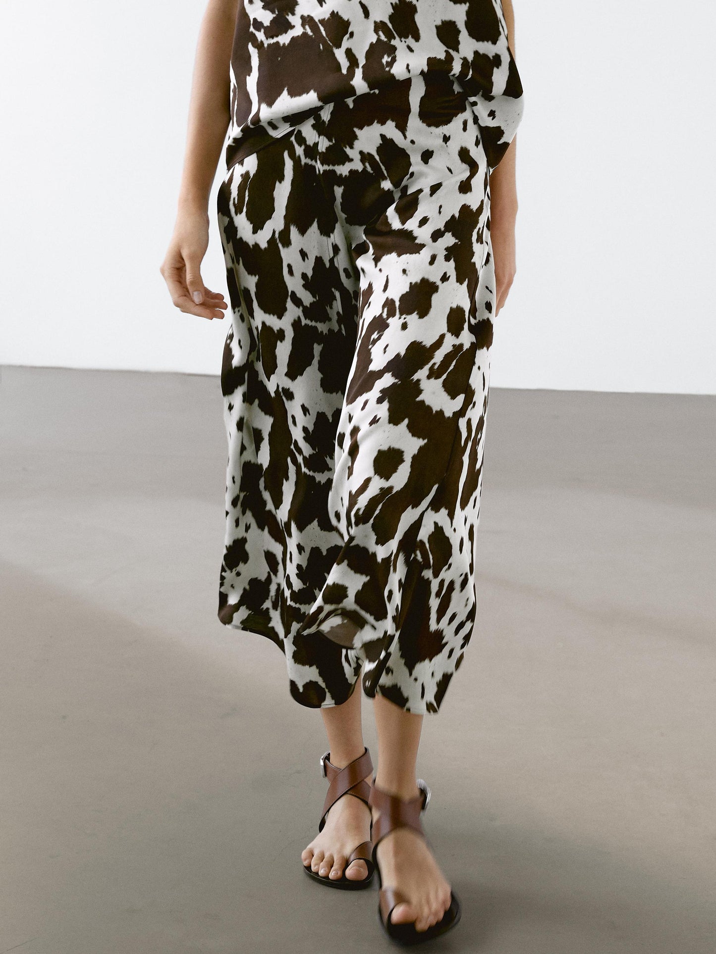 Flowing strappy animal print top