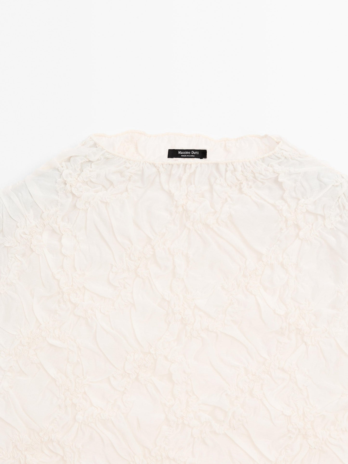 Creased-effect funnel neck top