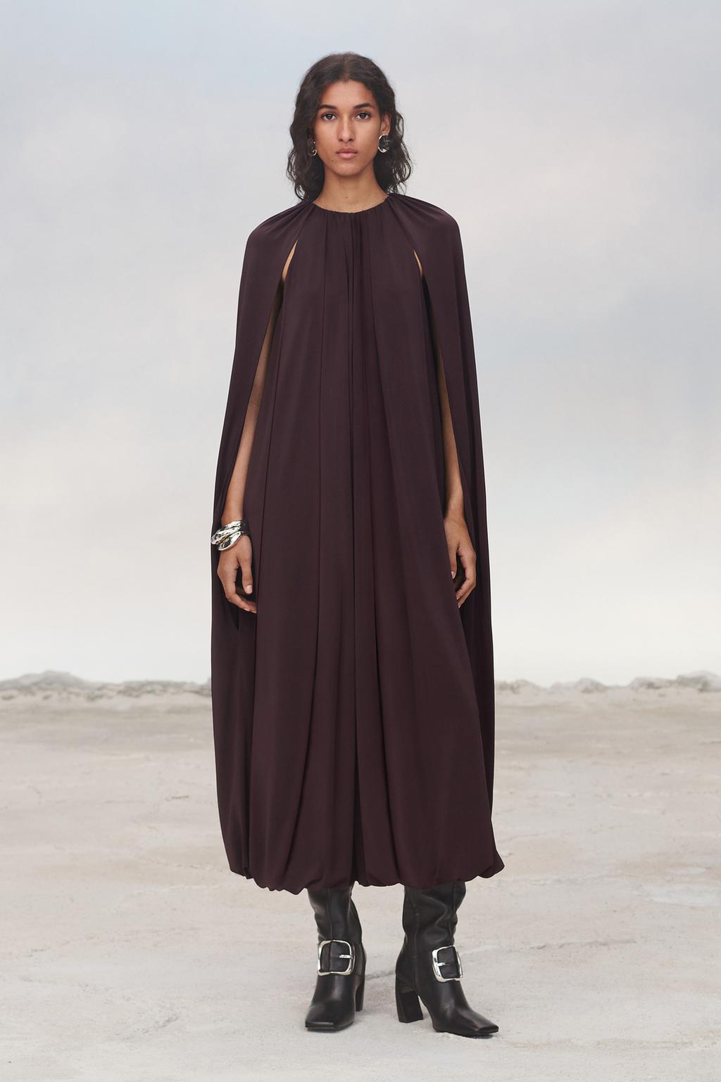 Limited edition cape dress with belt