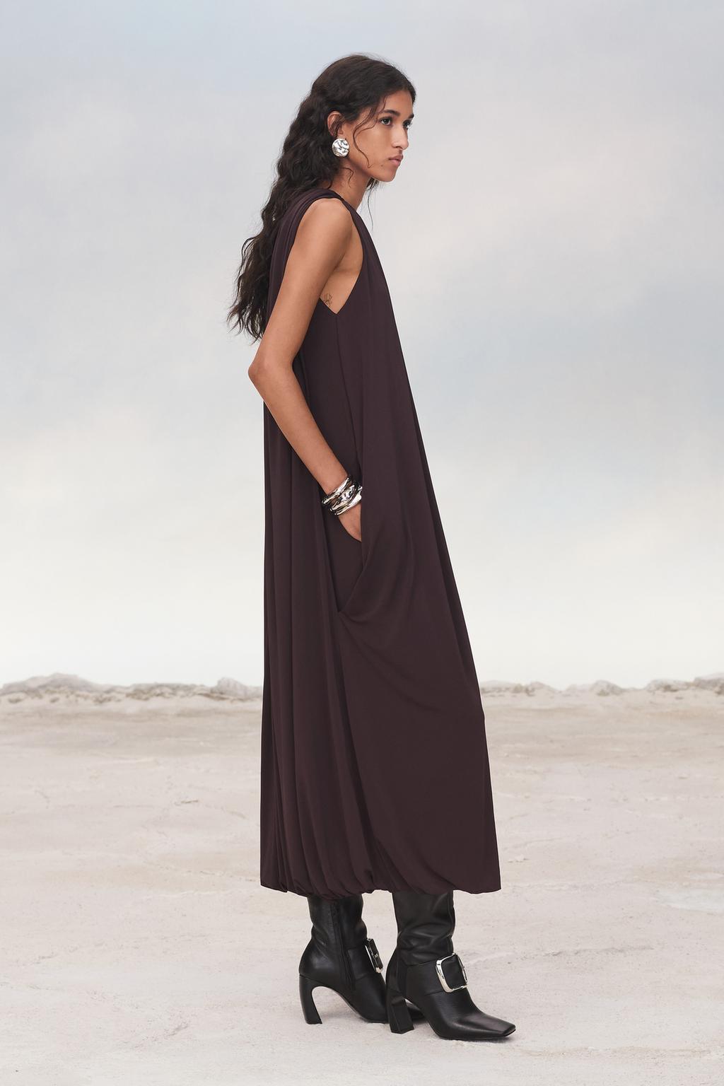 Limited edition cape dress with belt