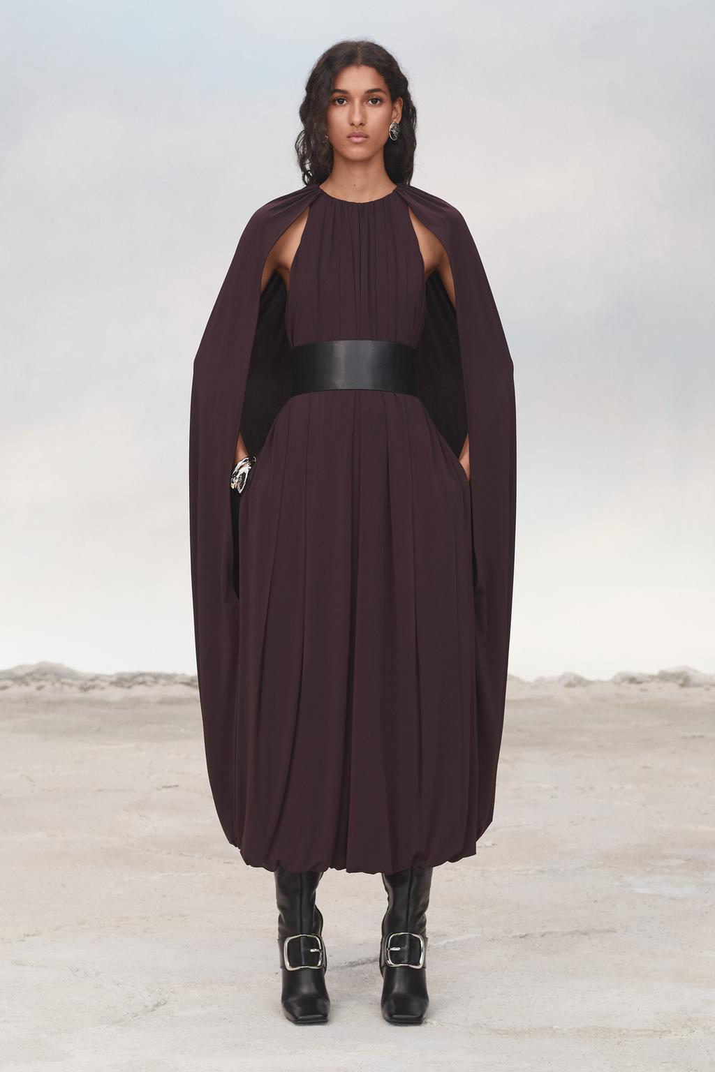 Limited edition cape dress with belt