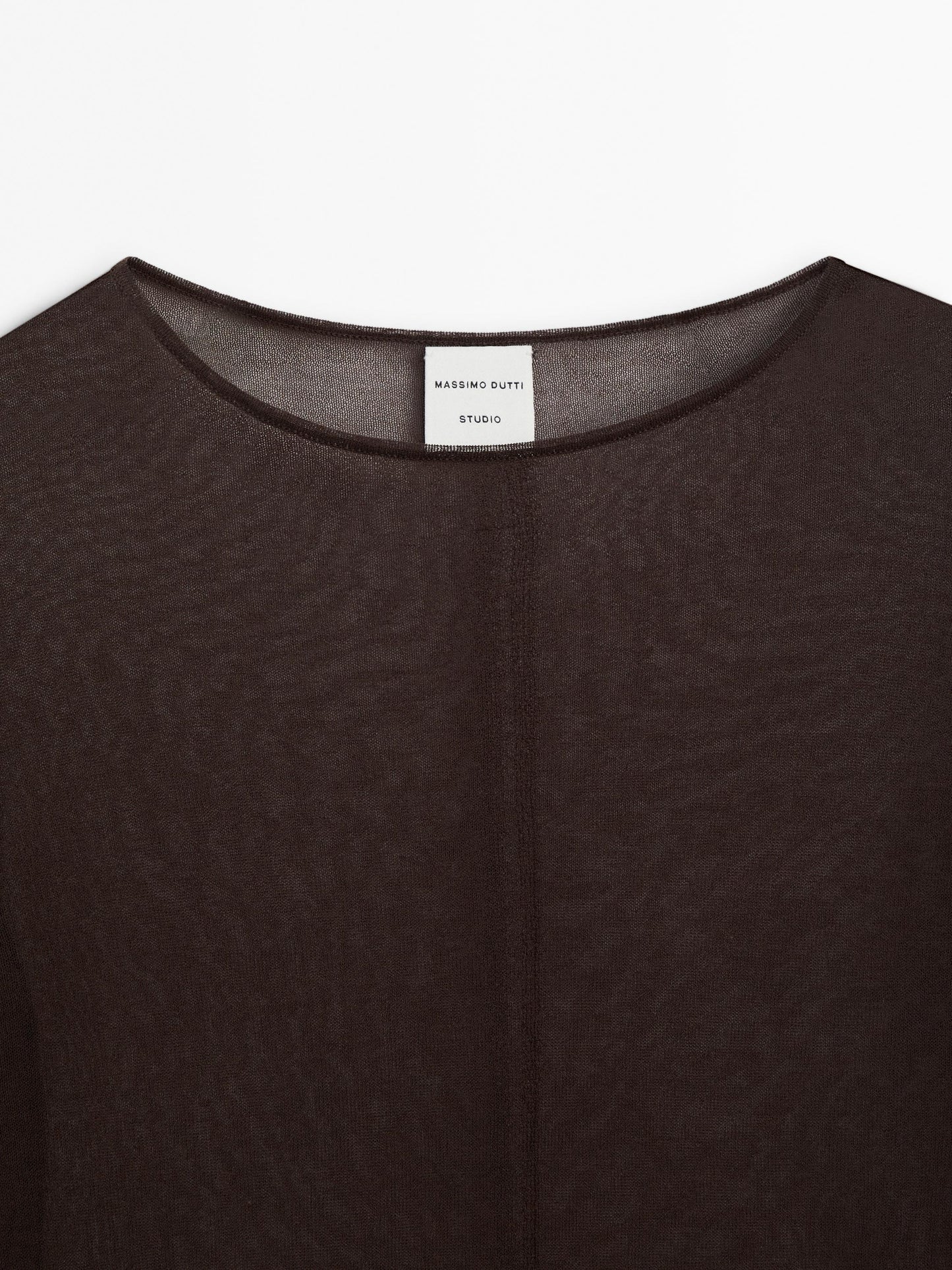 Semi-sheer sweater with seam detail