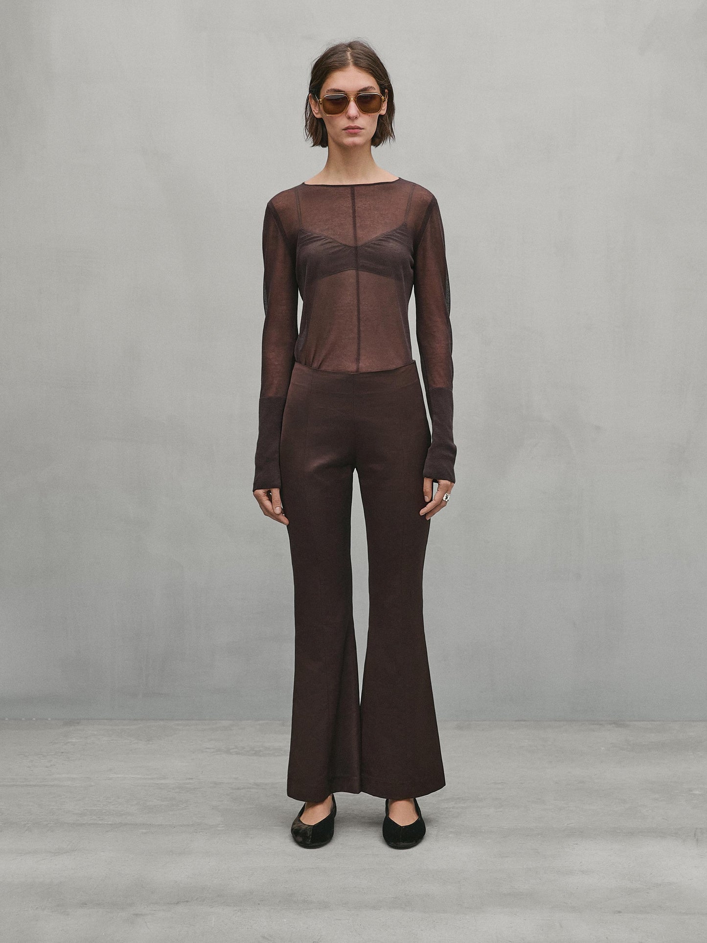 Semi-sheer sweater with seam detail