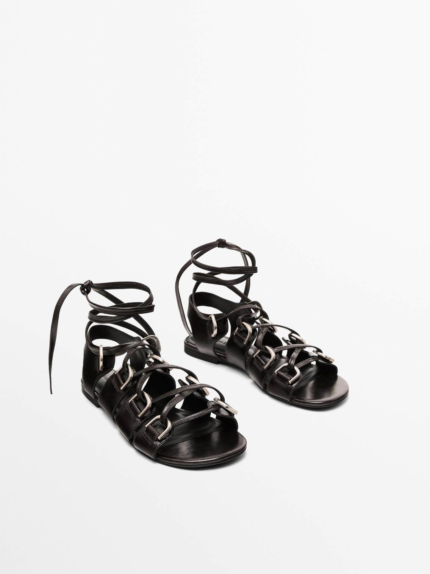 Lace-up sandals with rings