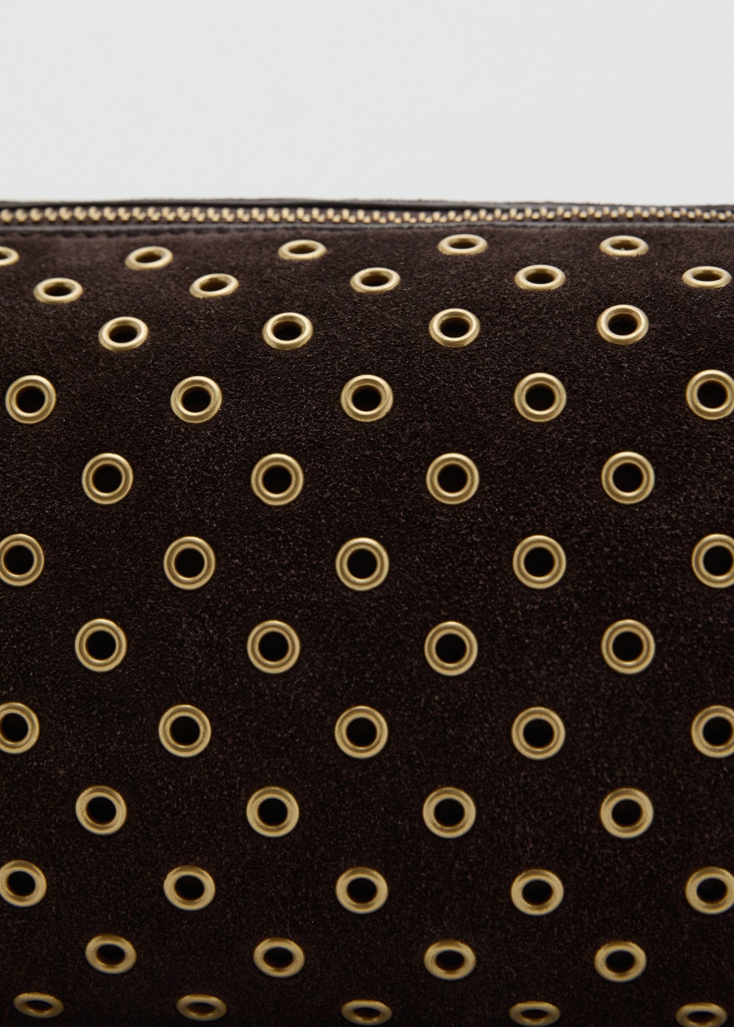 Suede shoulder bag with eyelets