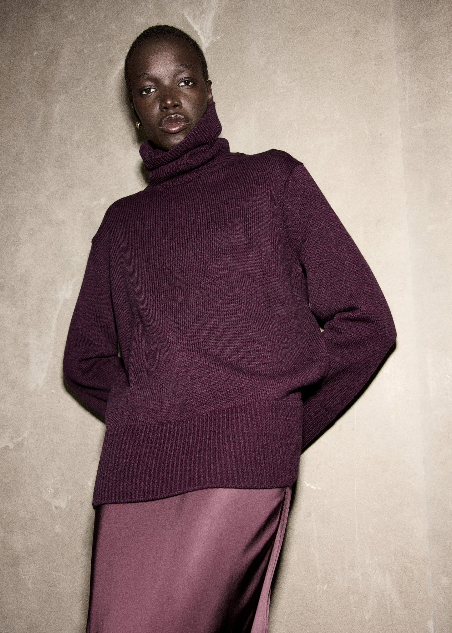 Turtleneck sweater with slits