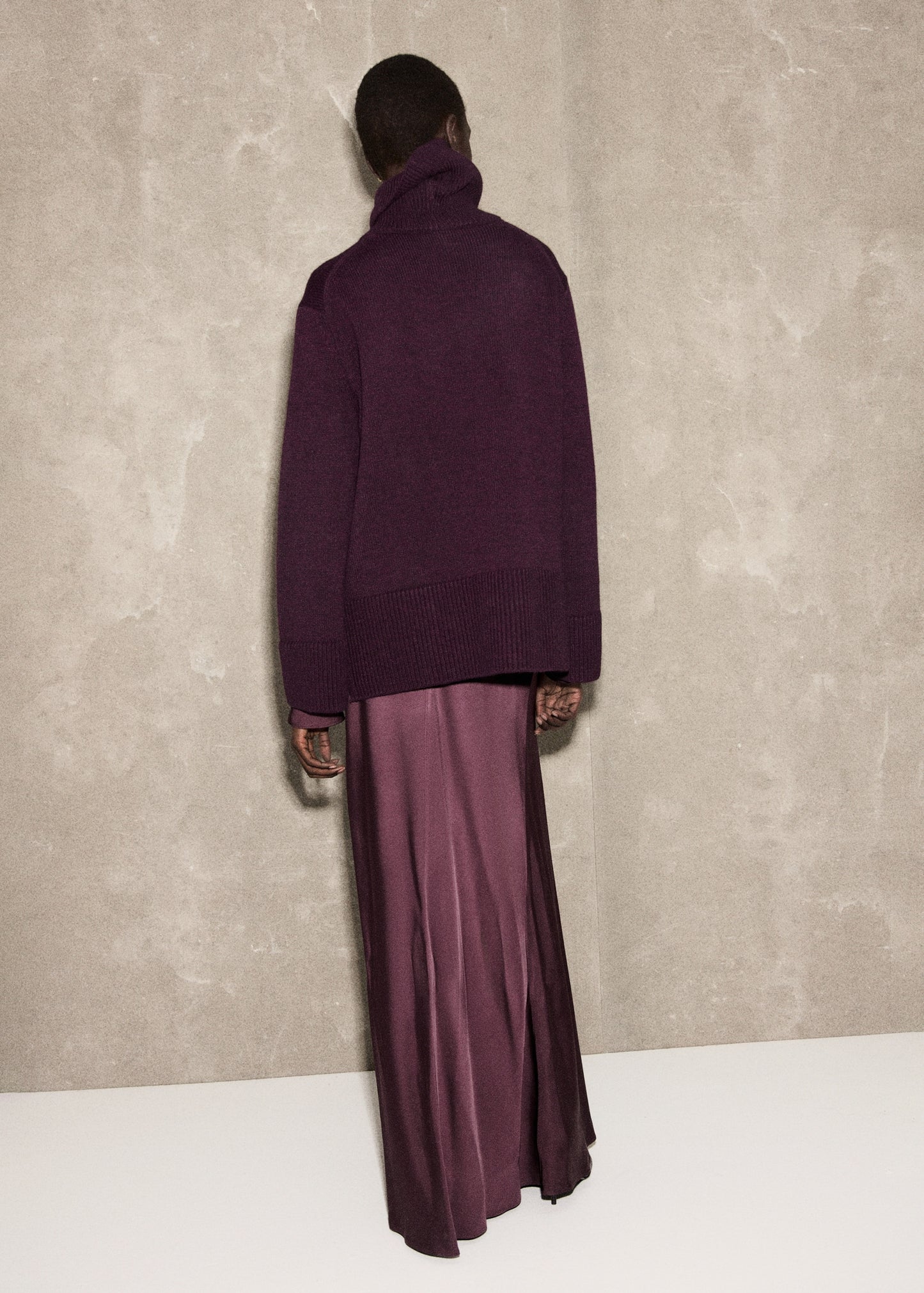 Turtleneck sweater with slits