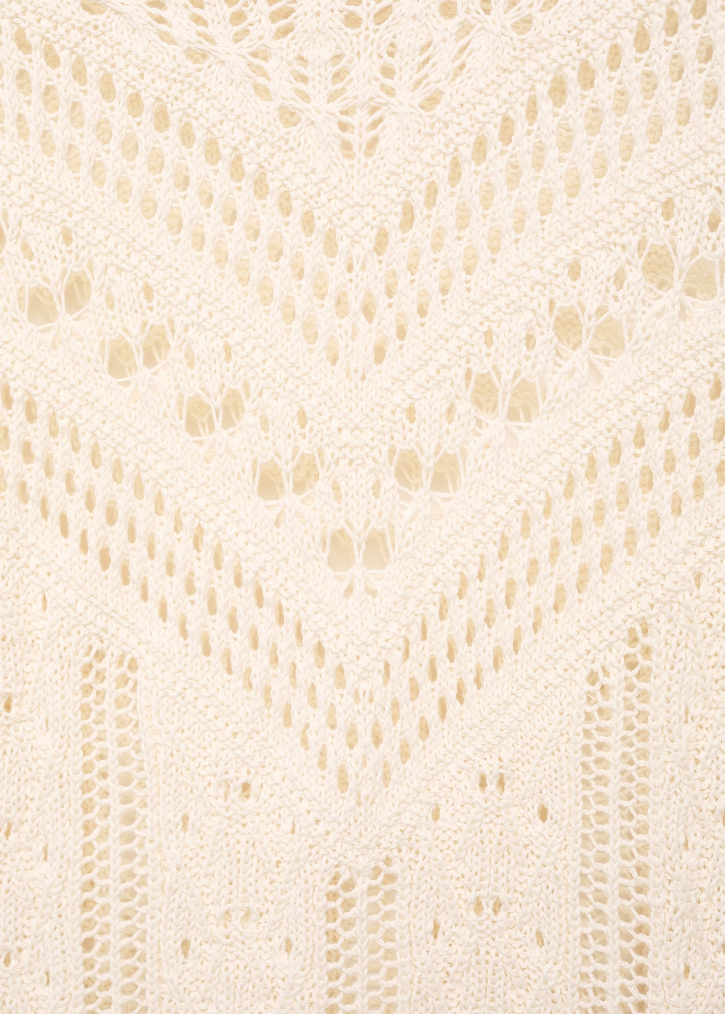 Knitted sweater with openwork details