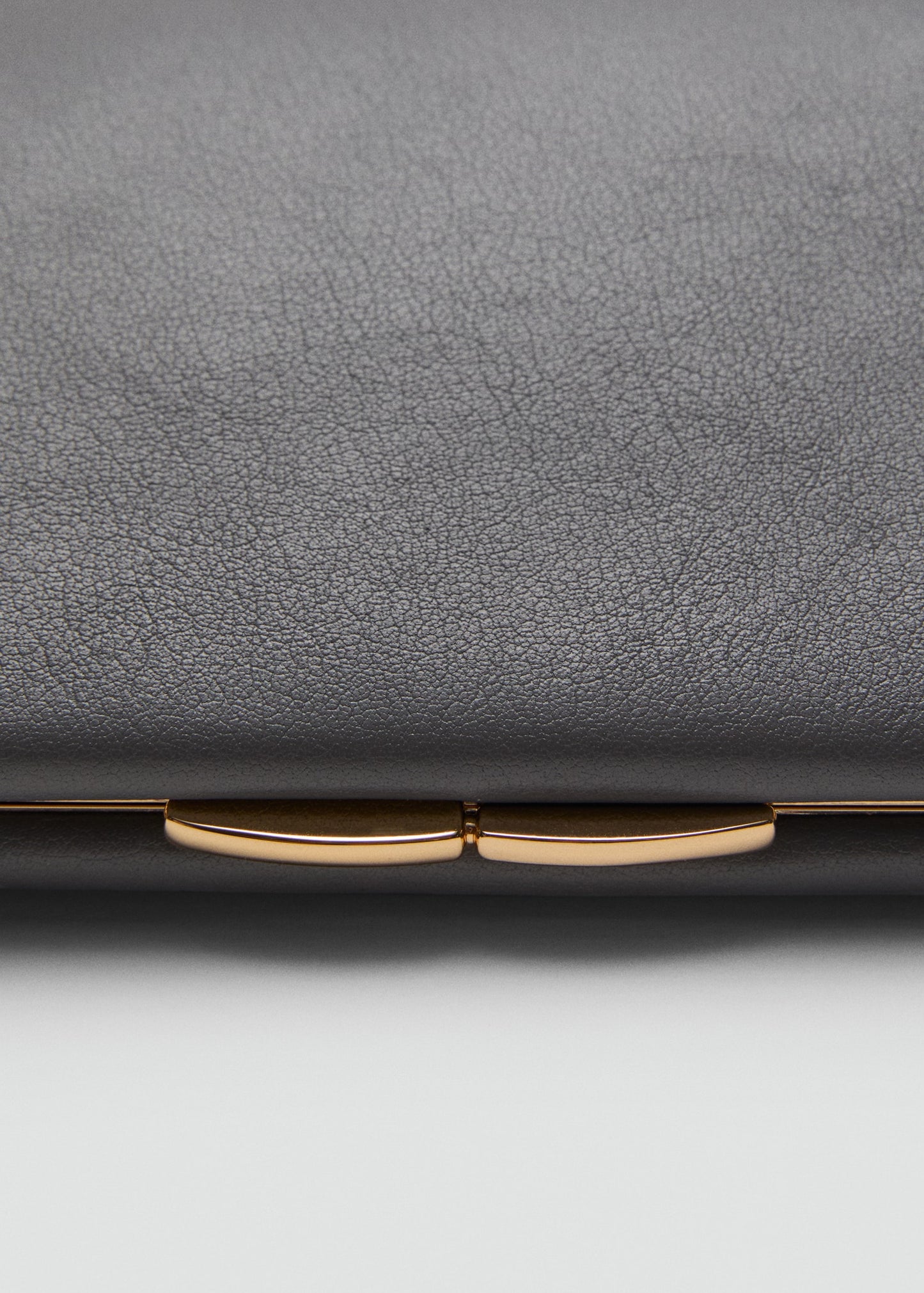 100% leather clutch