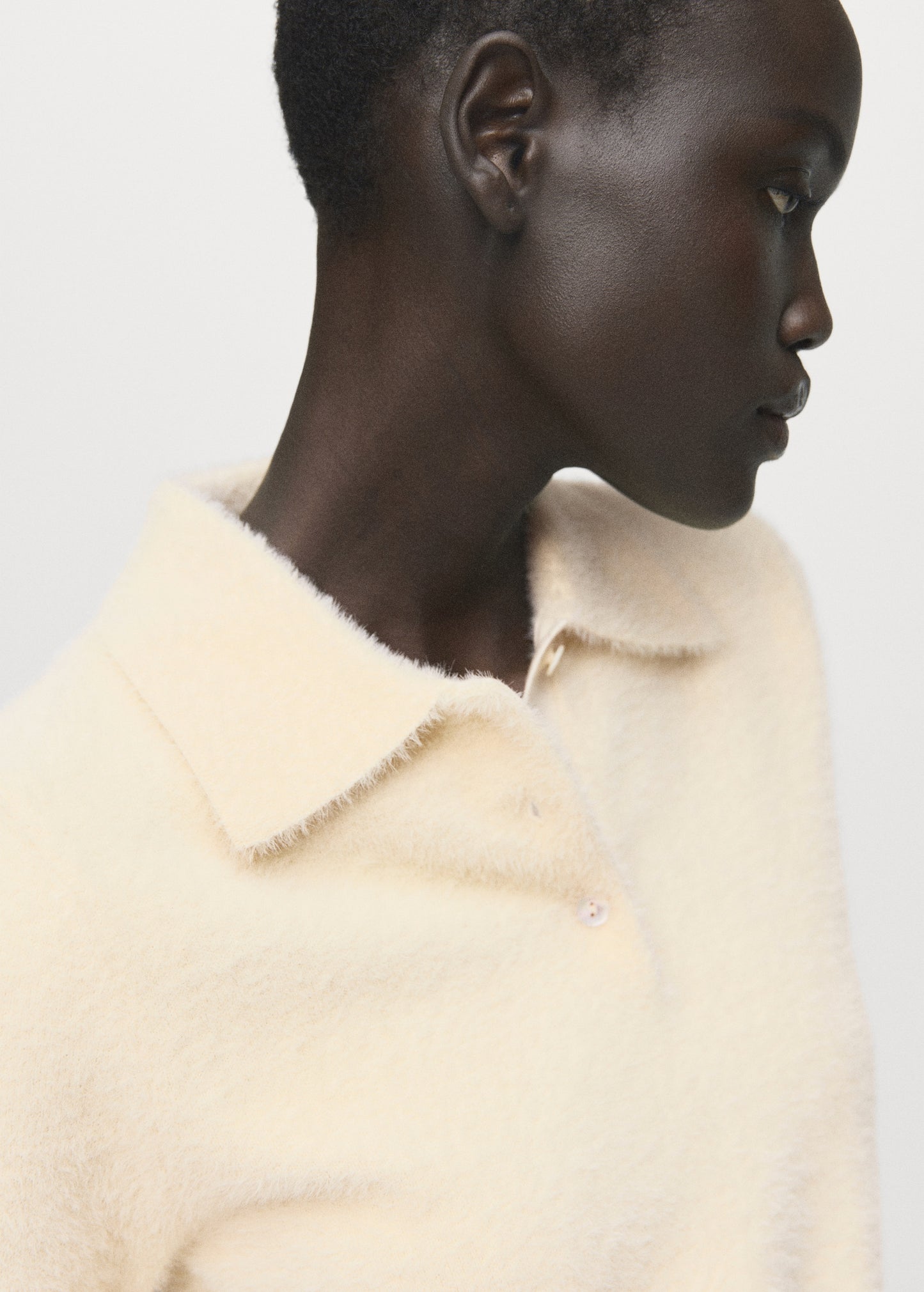Faux fur effect polo collar jumper