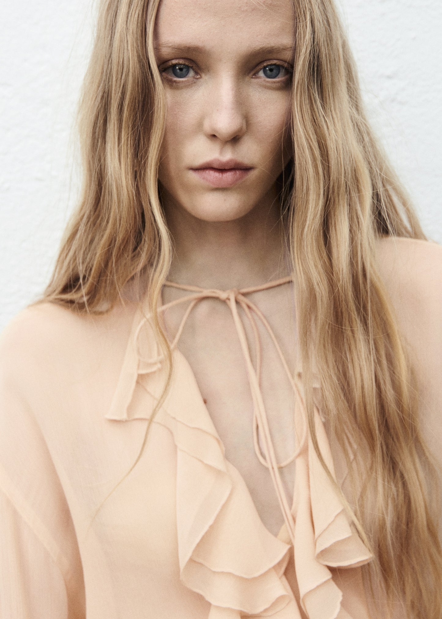 Ruffled blouse with flared sleeves