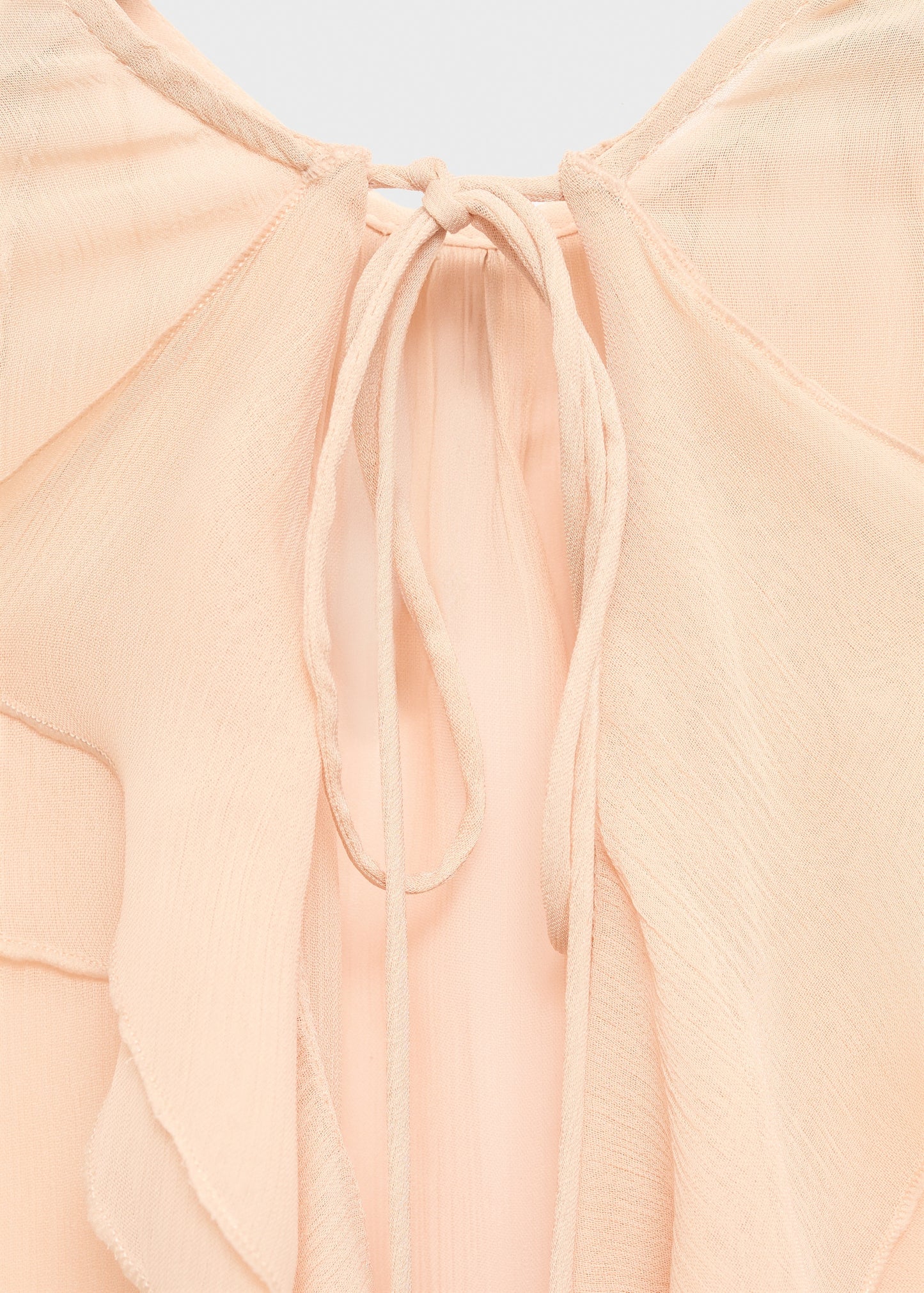 Ruffled blouse with flared sleeves