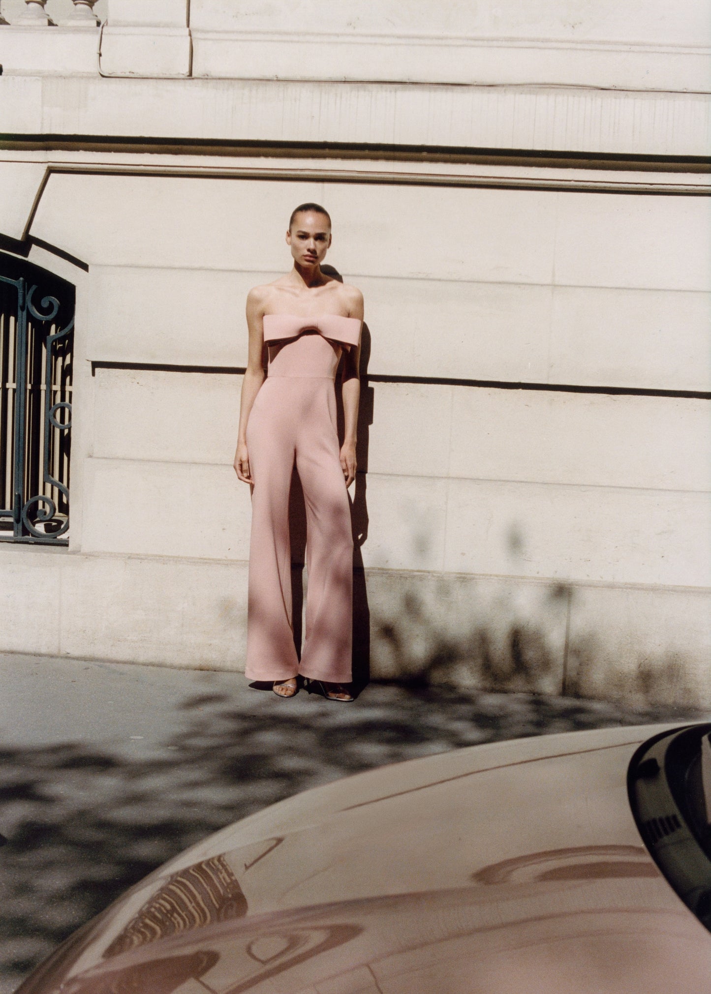 Strapless jumpsuit with bow neckline
