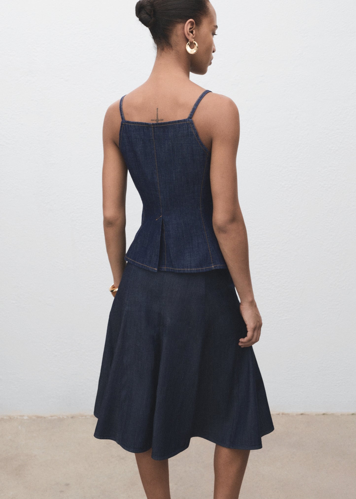 Pleated denim skirt