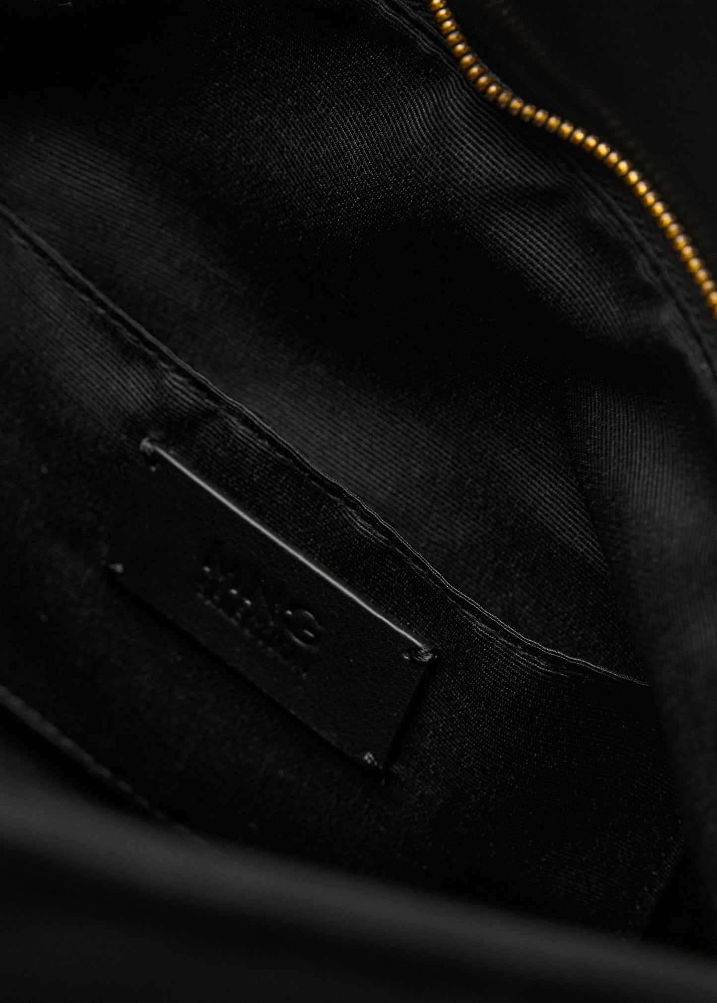 Leather clutch bag with metallic detail