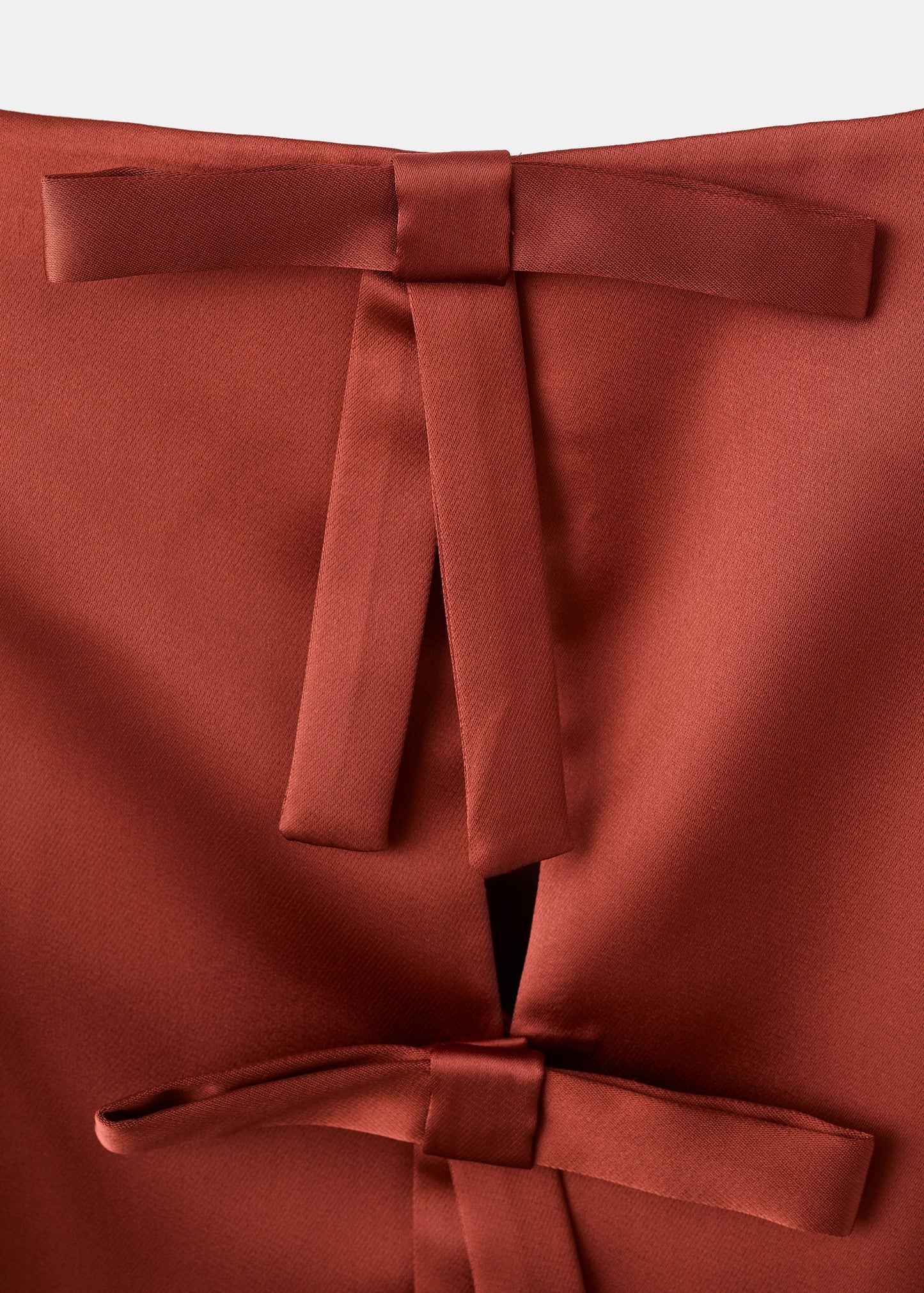 Satin top with bows