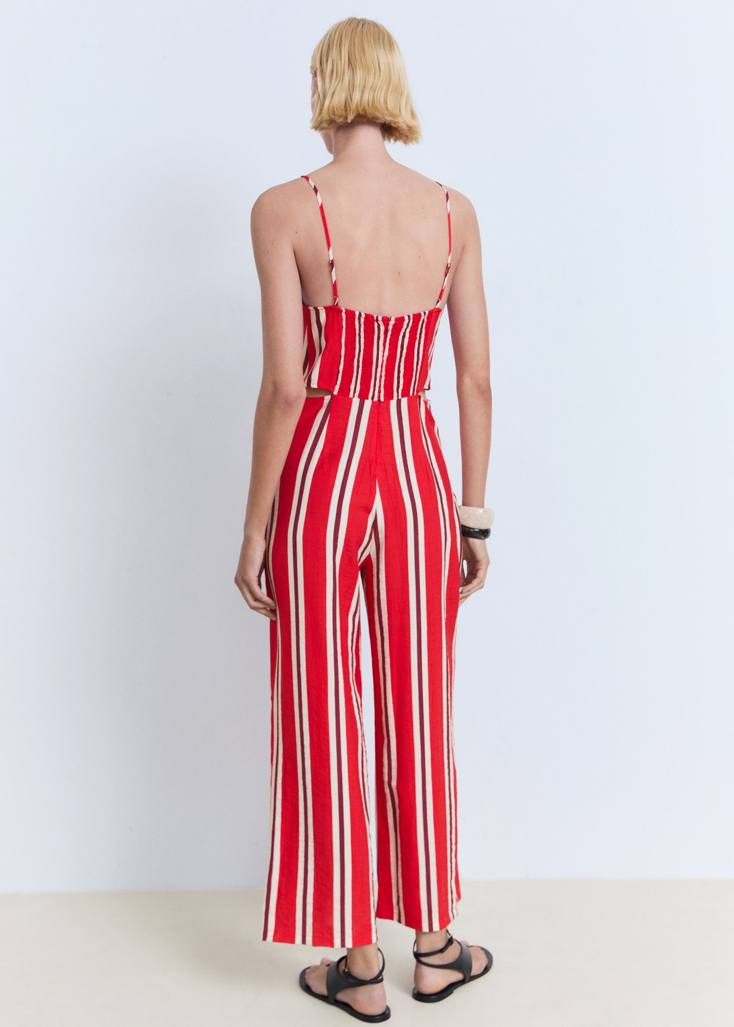Striped jumpsuit with cut-out