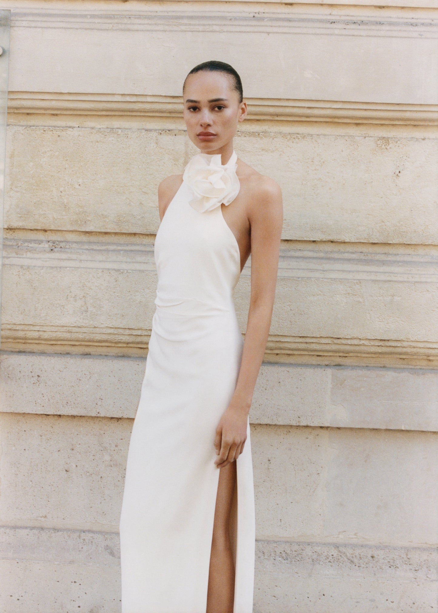Draped halter-neck dress with flower motif