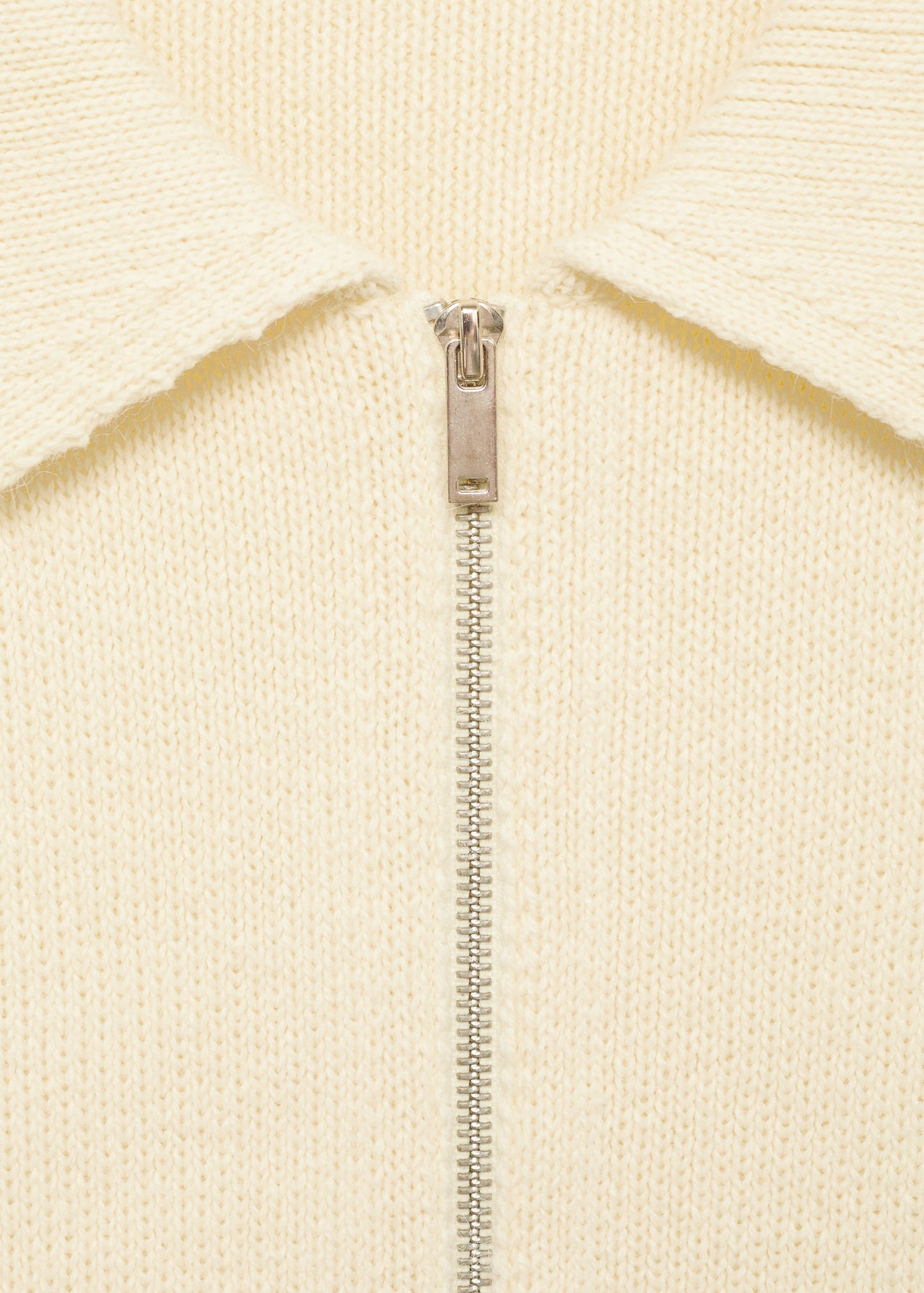 Knitted jacket with belt buckle