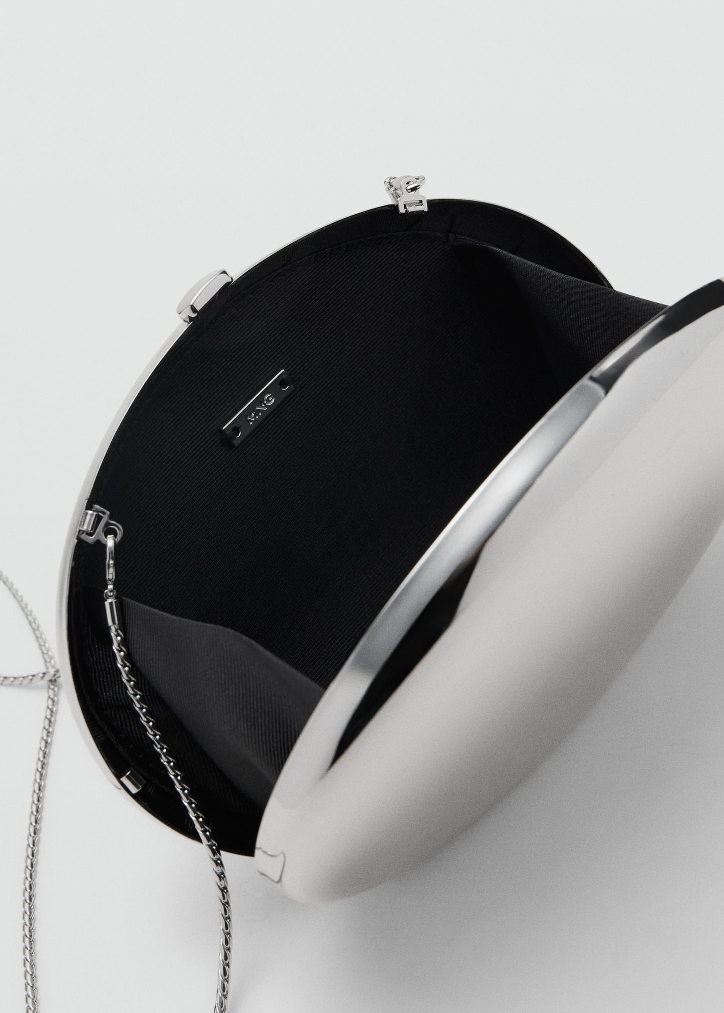 Oval clutch bag