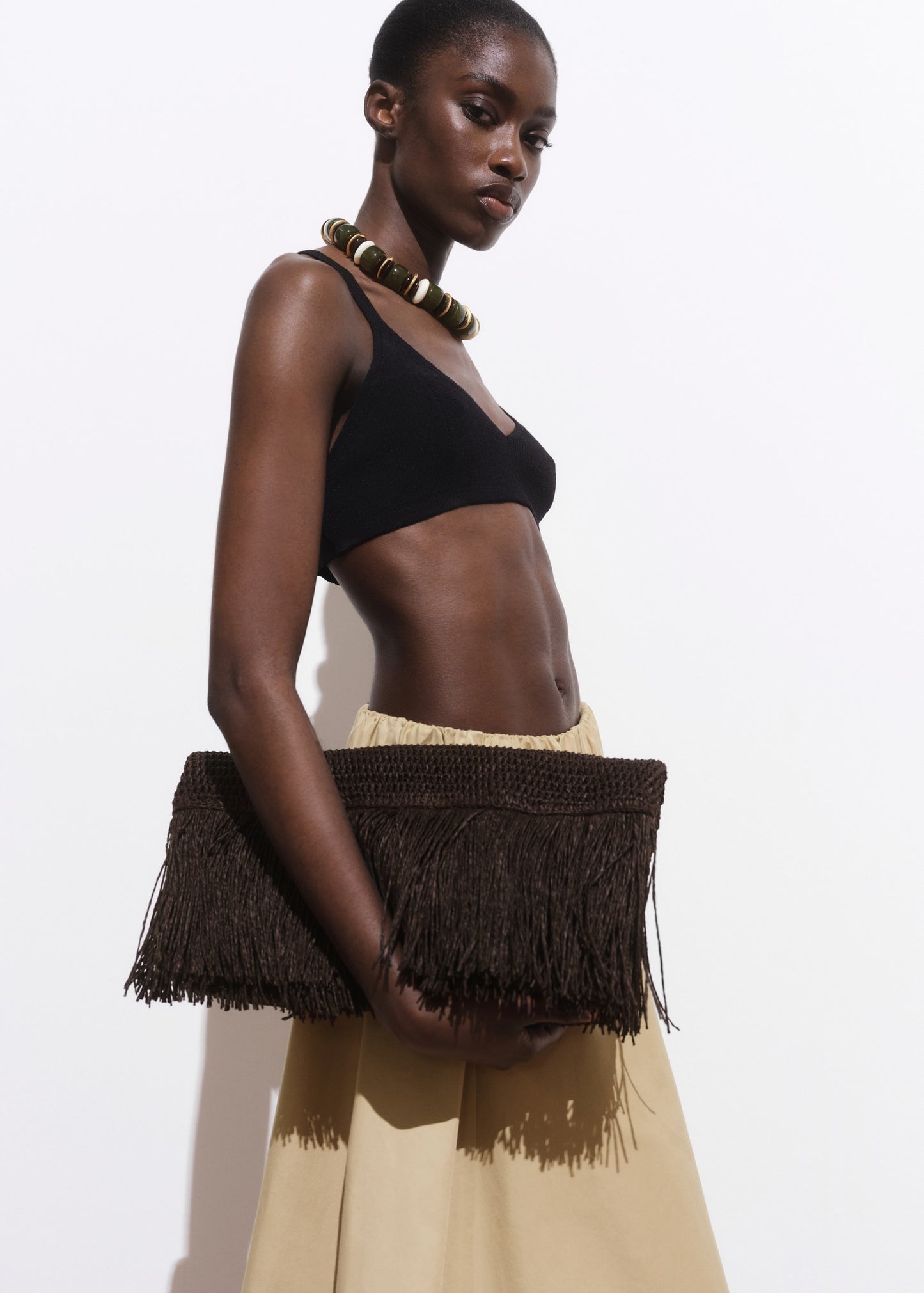 Natural fibre handbag with fringes
