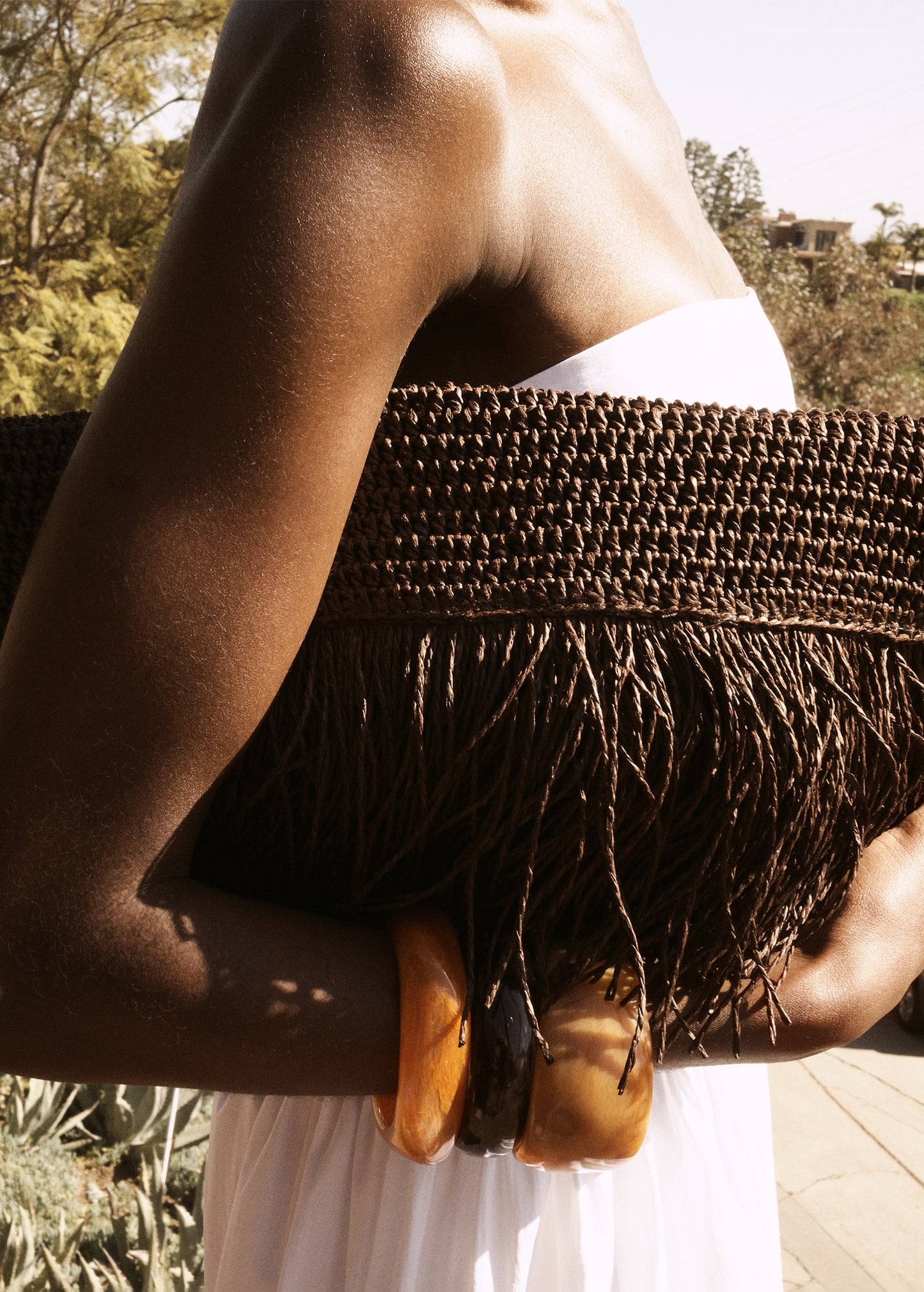 Natural fibre handbag with fringes