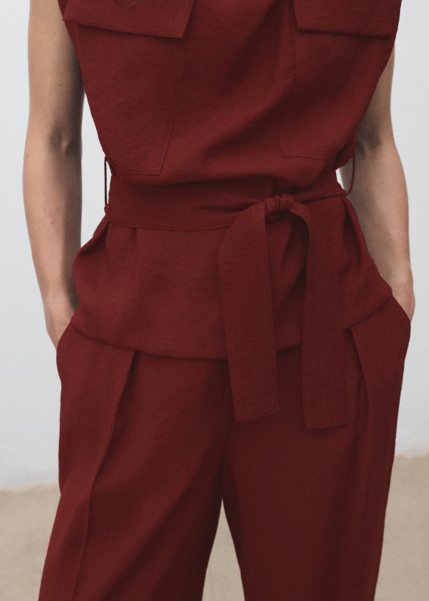 Blouse with draped neck and belt