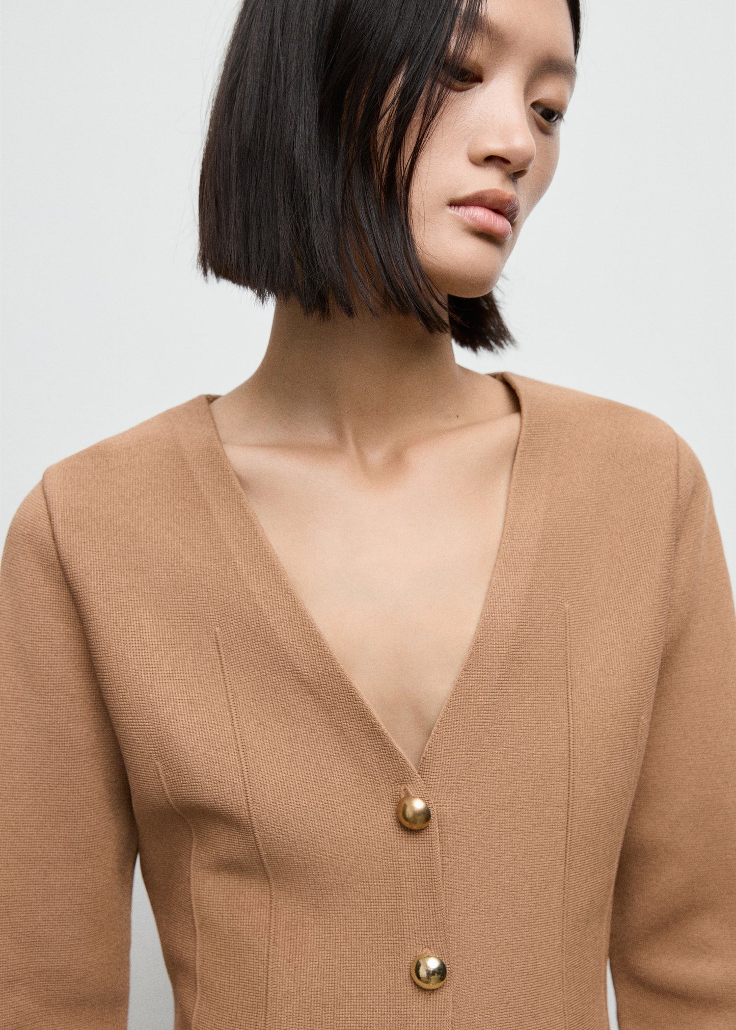 Fitted knitted jacket with buttons
