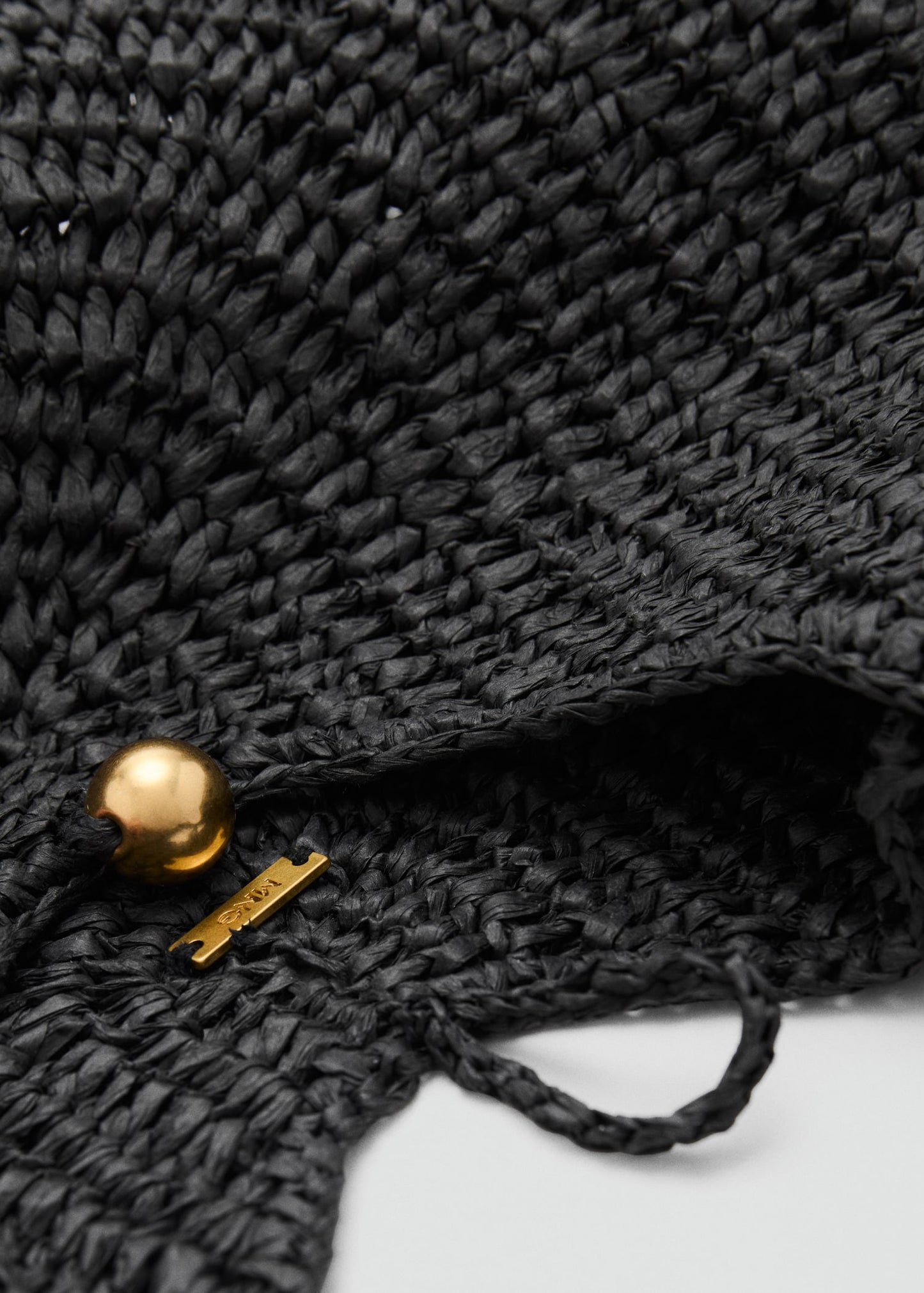 Natural fibre oval shoulder bag