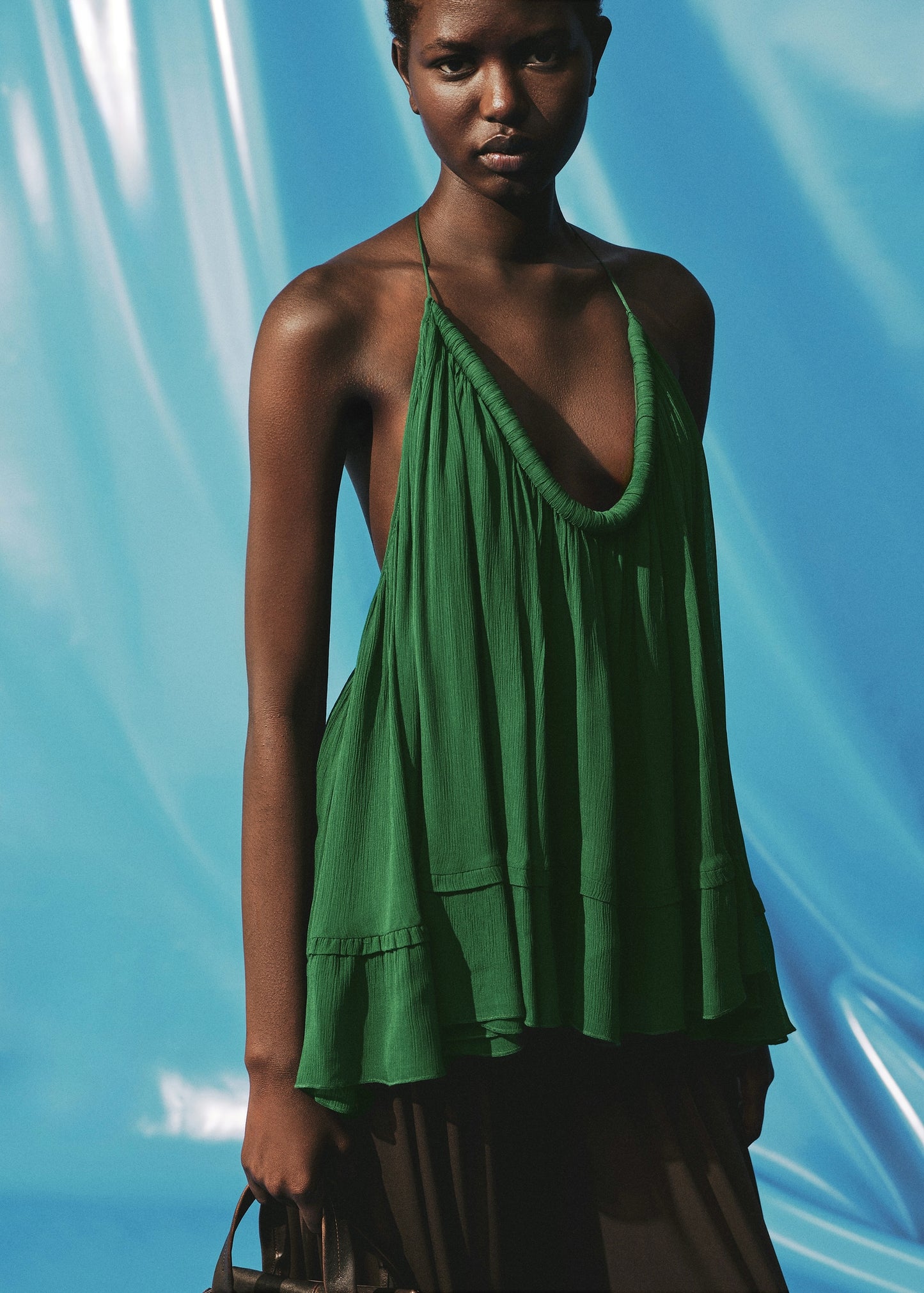 Pleated top with low back neckline