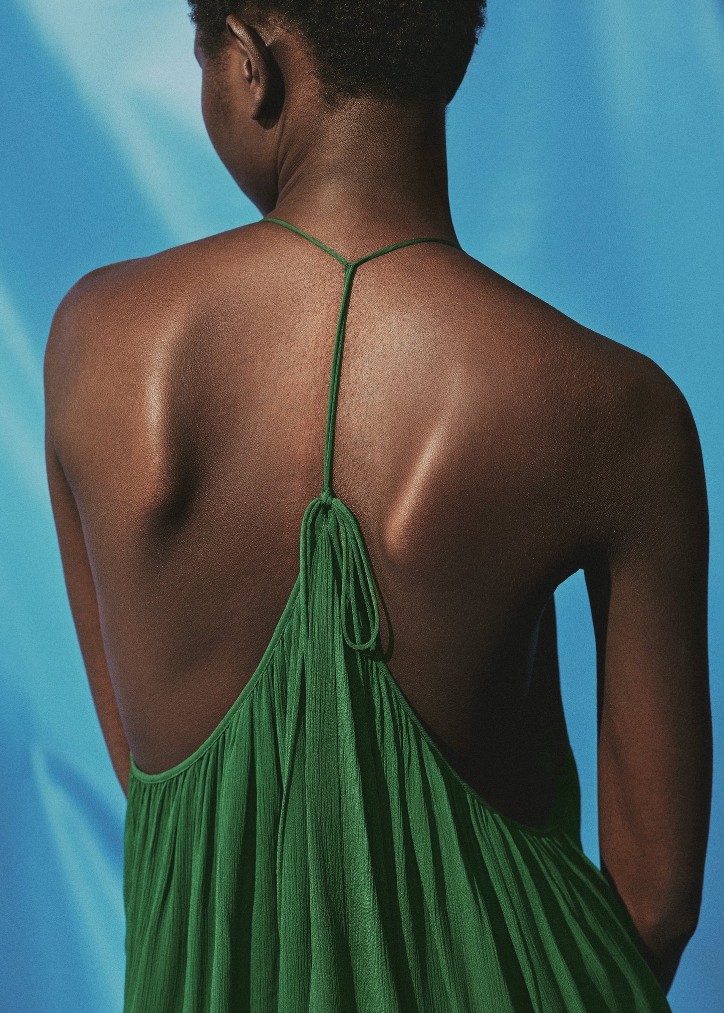 Pleated top with low back neckline