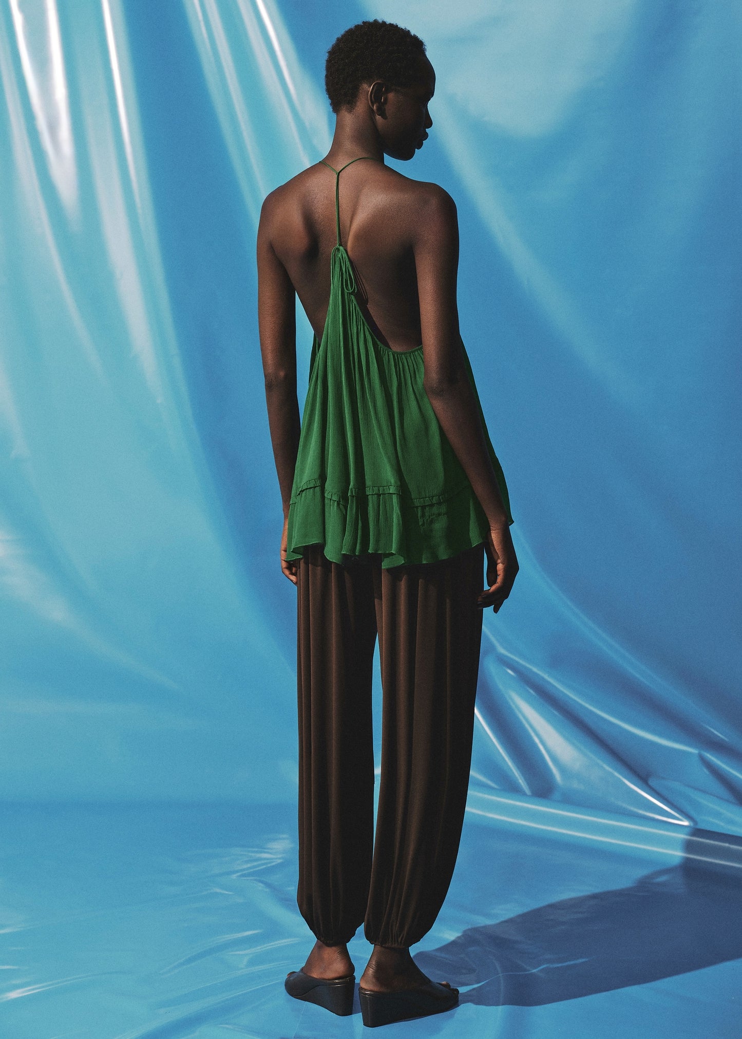 Pleated top with low back neckline