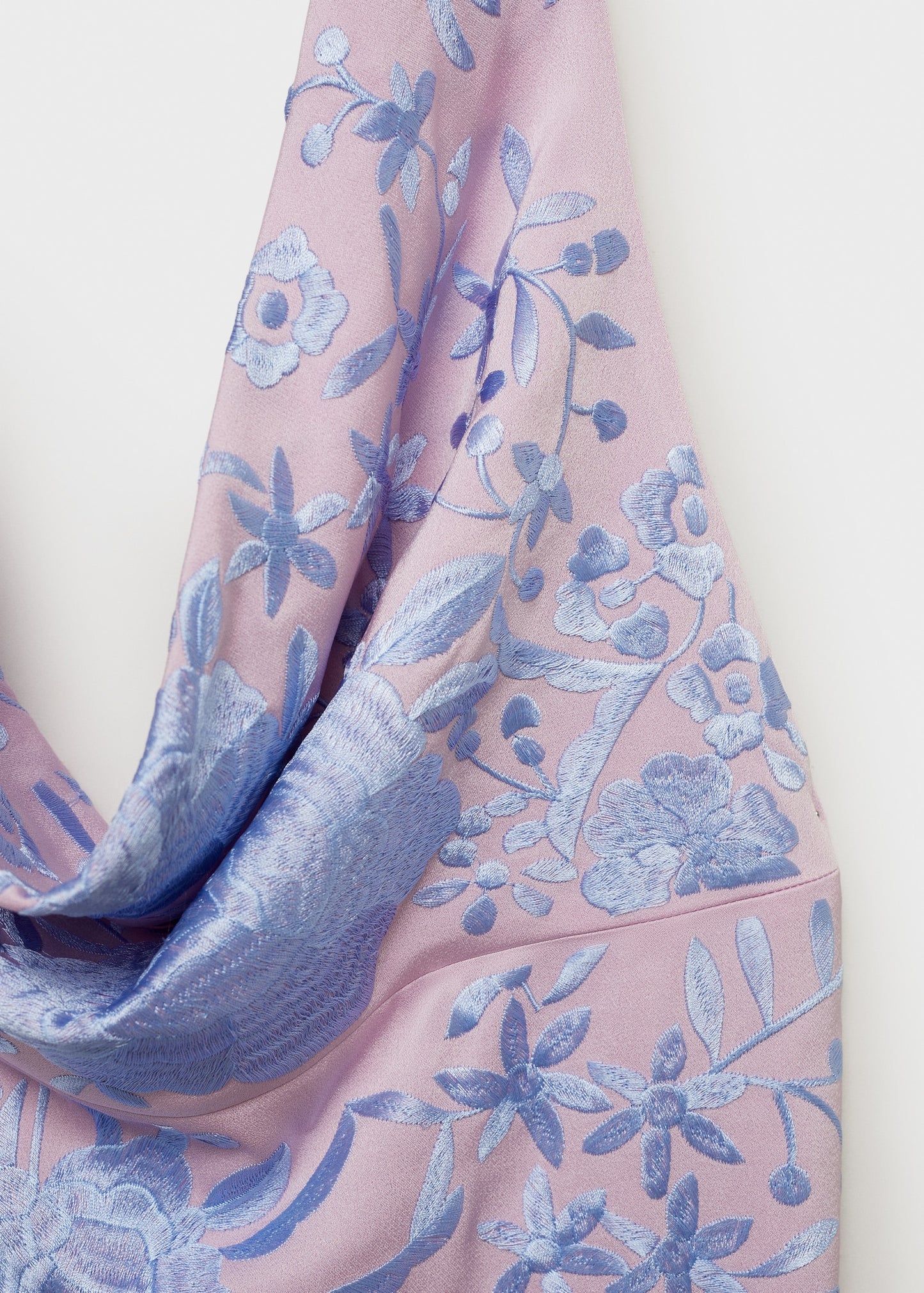 Asymmetrical dress with embroidered fringes