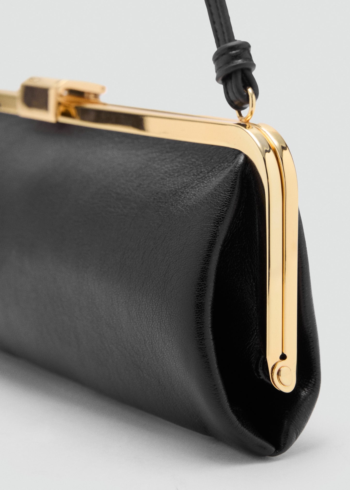 Metallic clutch handbag