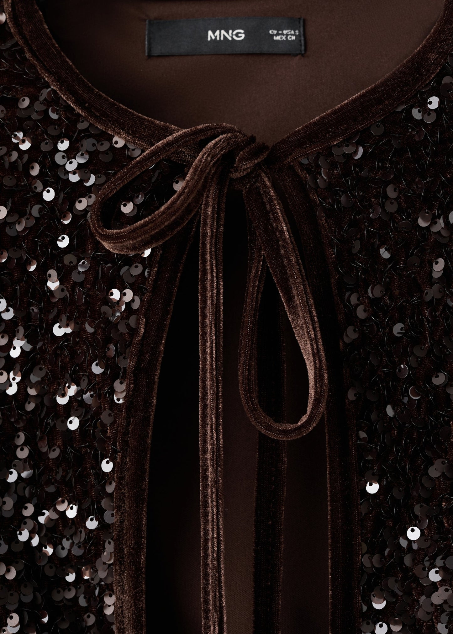 Velvet jacket with sequins and bow