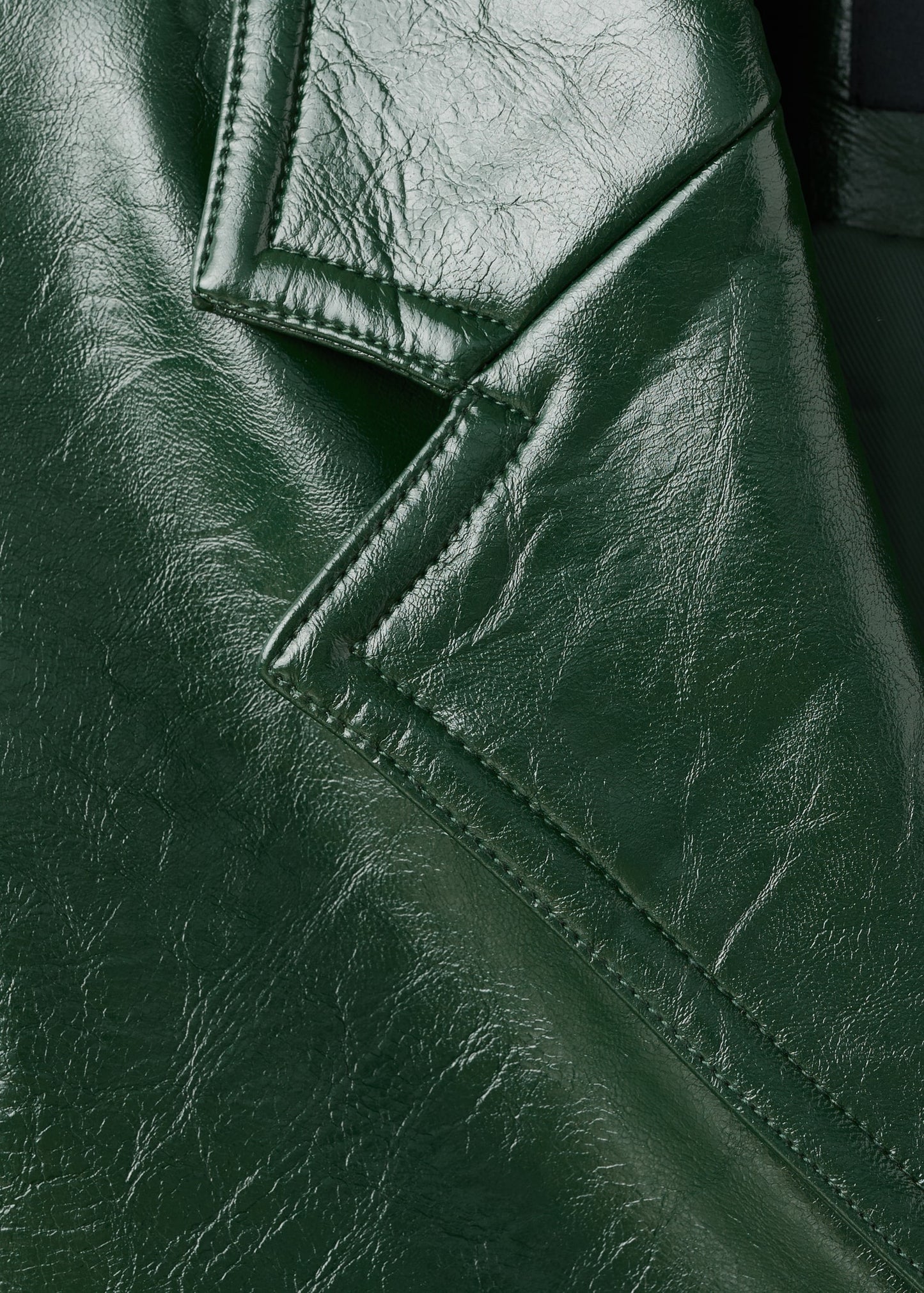 Long faux leather effect coat