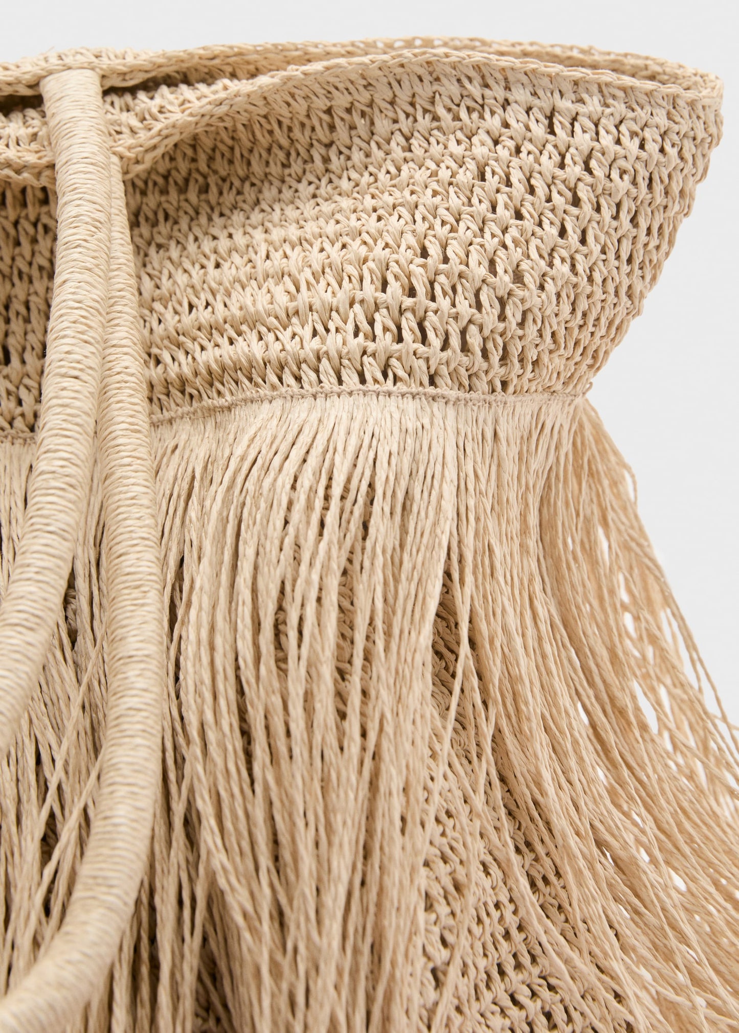 Natural fibre shoulder bag with fringes