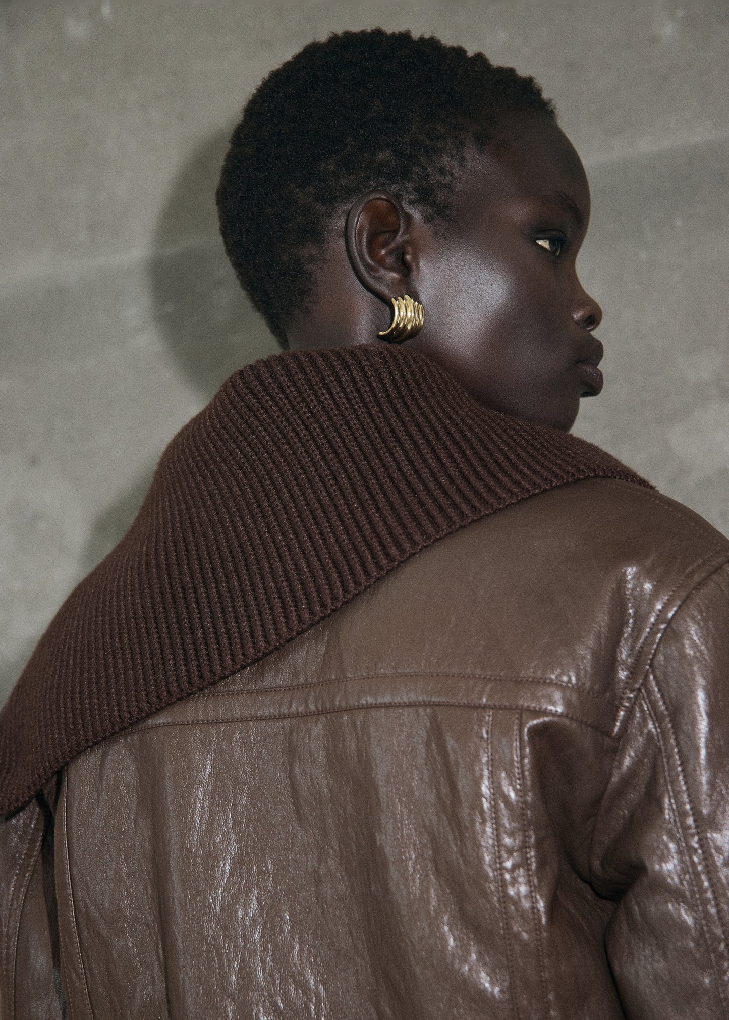 Leather-effect roll-neck jacket