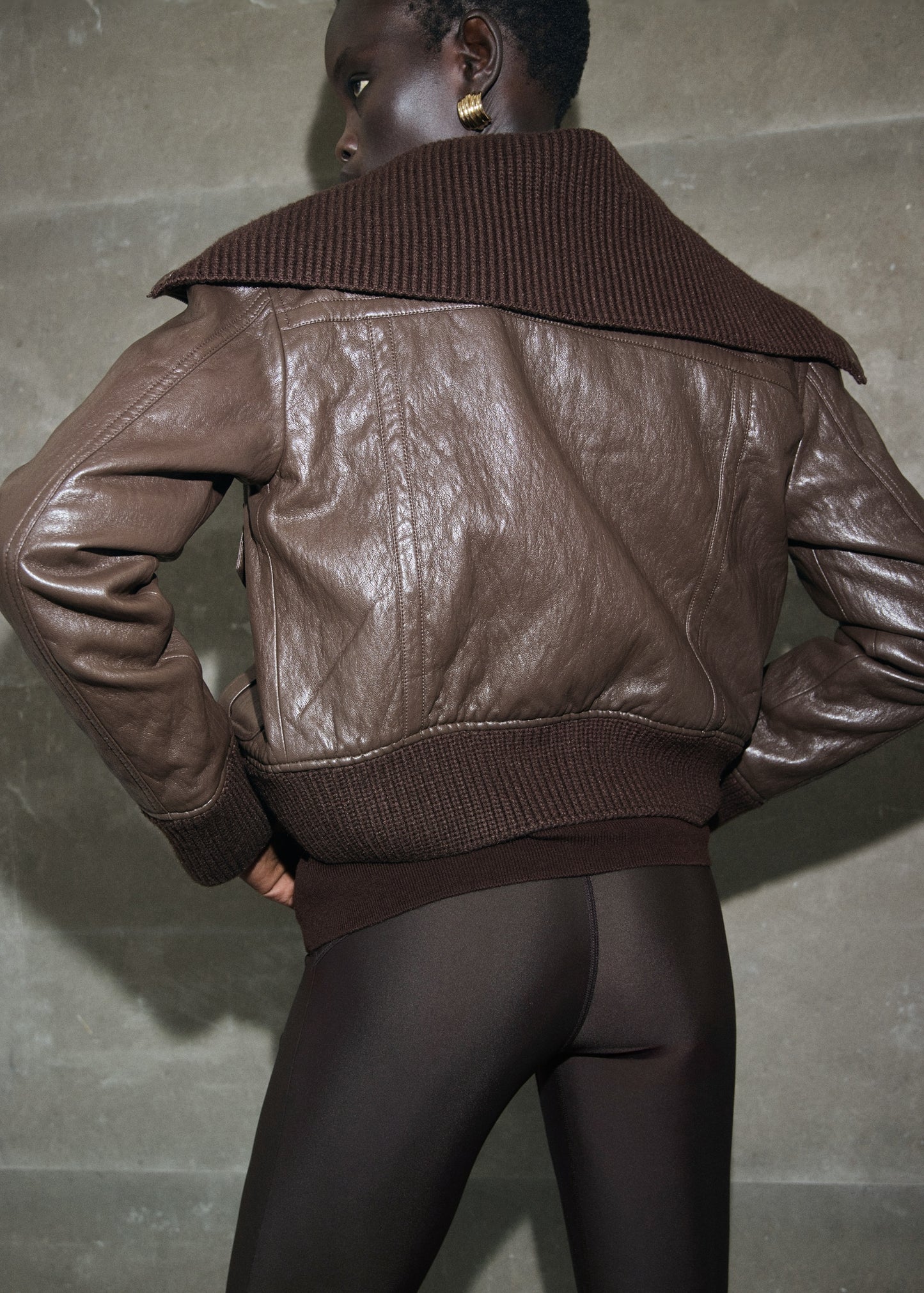 Leather-effect roll-neck jacket