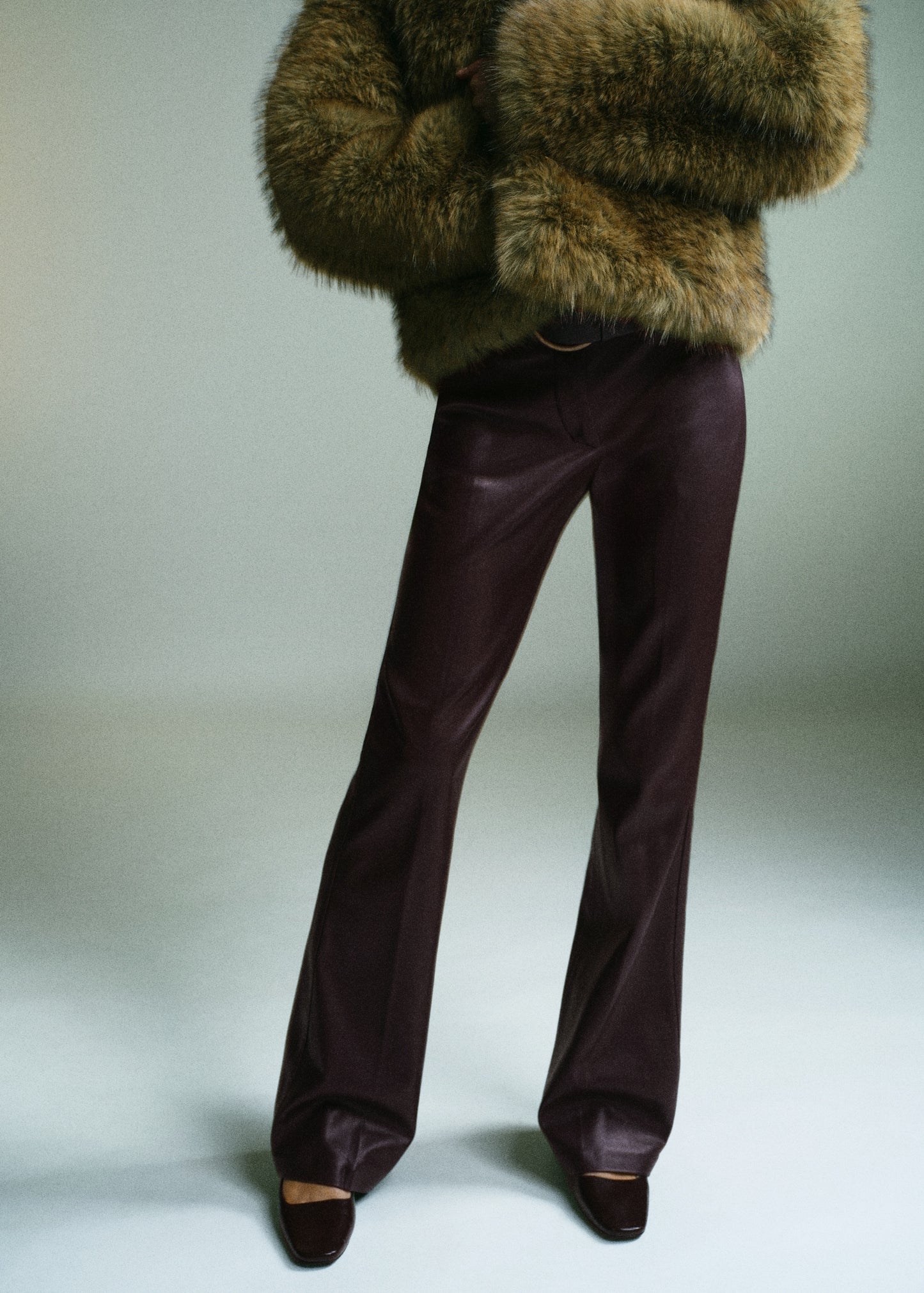 Leather-effect slim-fit trousers